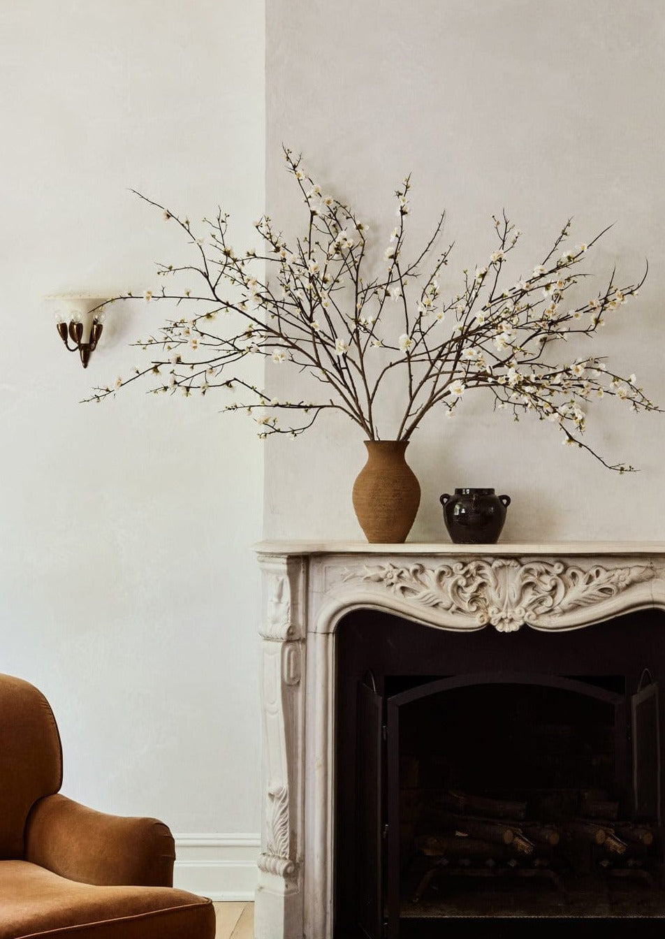 Faux Blossom Branches Styled in Clay Avery Vase at afloral