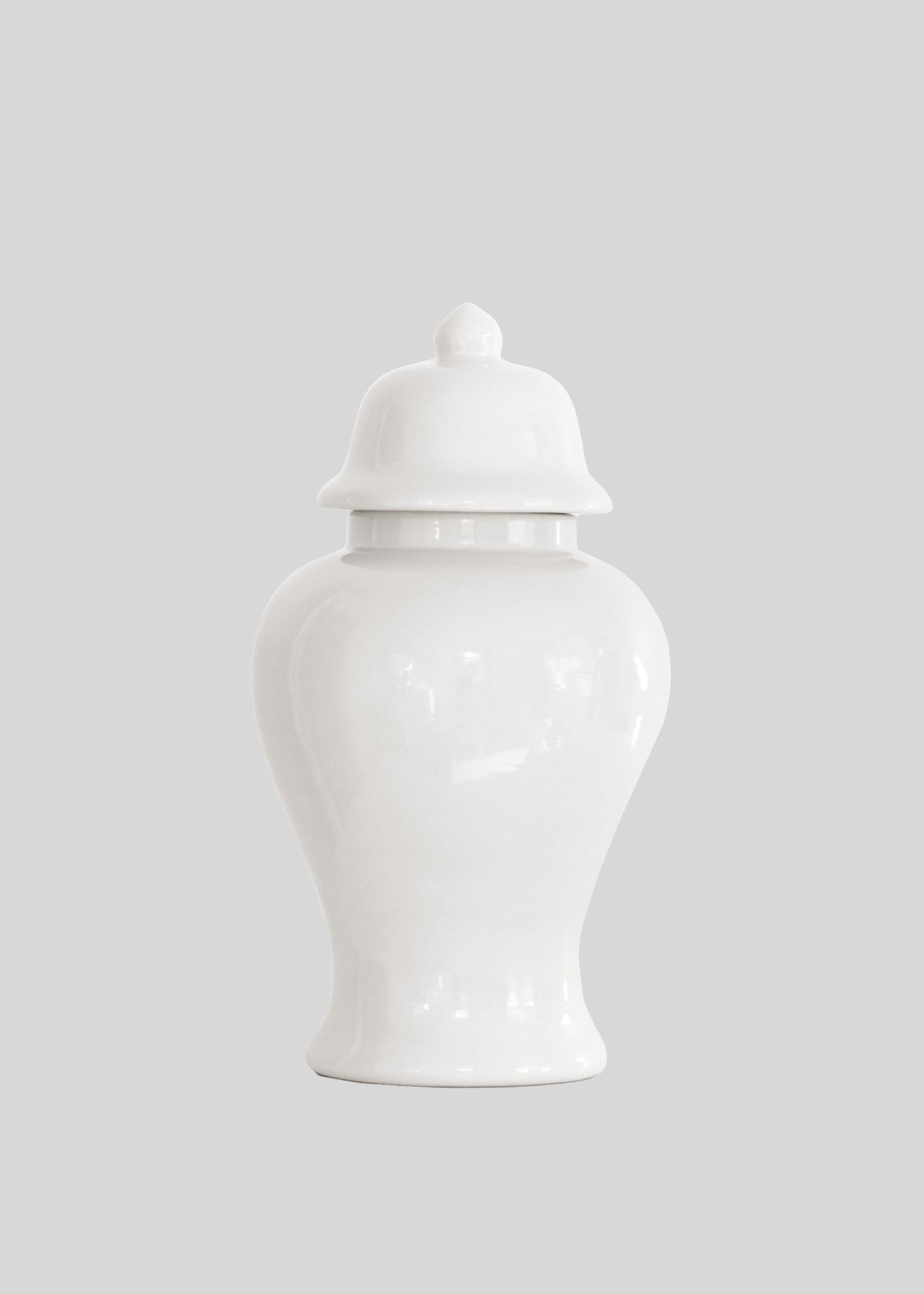 White ceramic jar with a lid