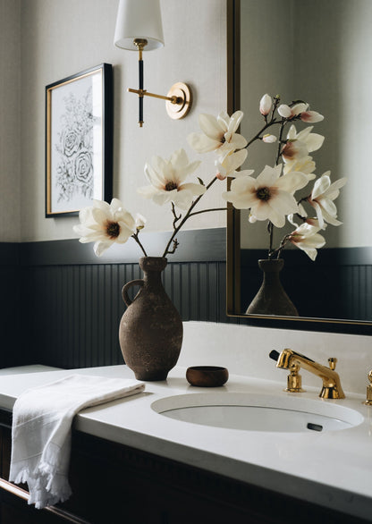 Clay Vase with Magnolias in Bathroom
