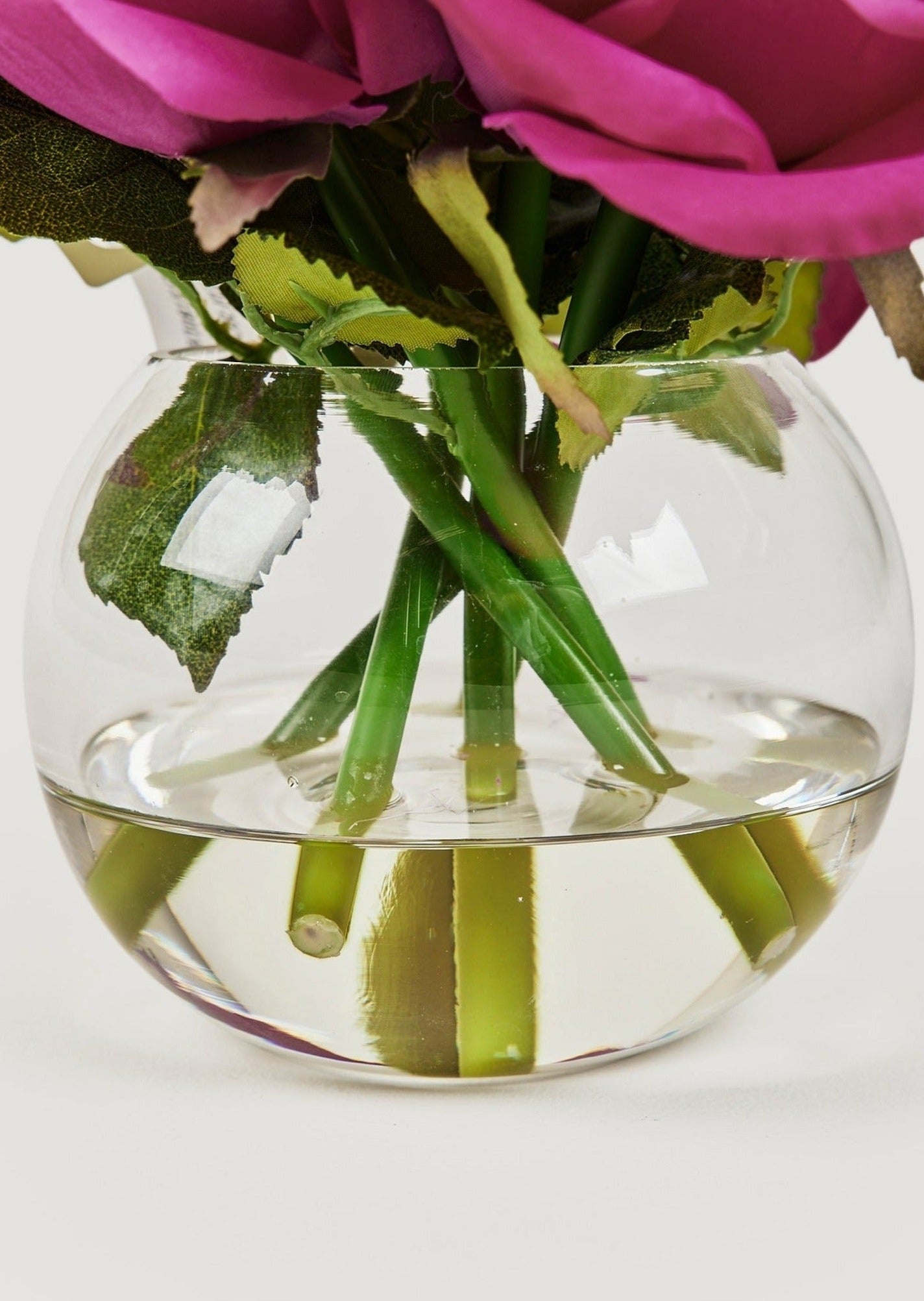 Faux Arrangements Fuchsia Real Touch Roses in Round Glass Vase