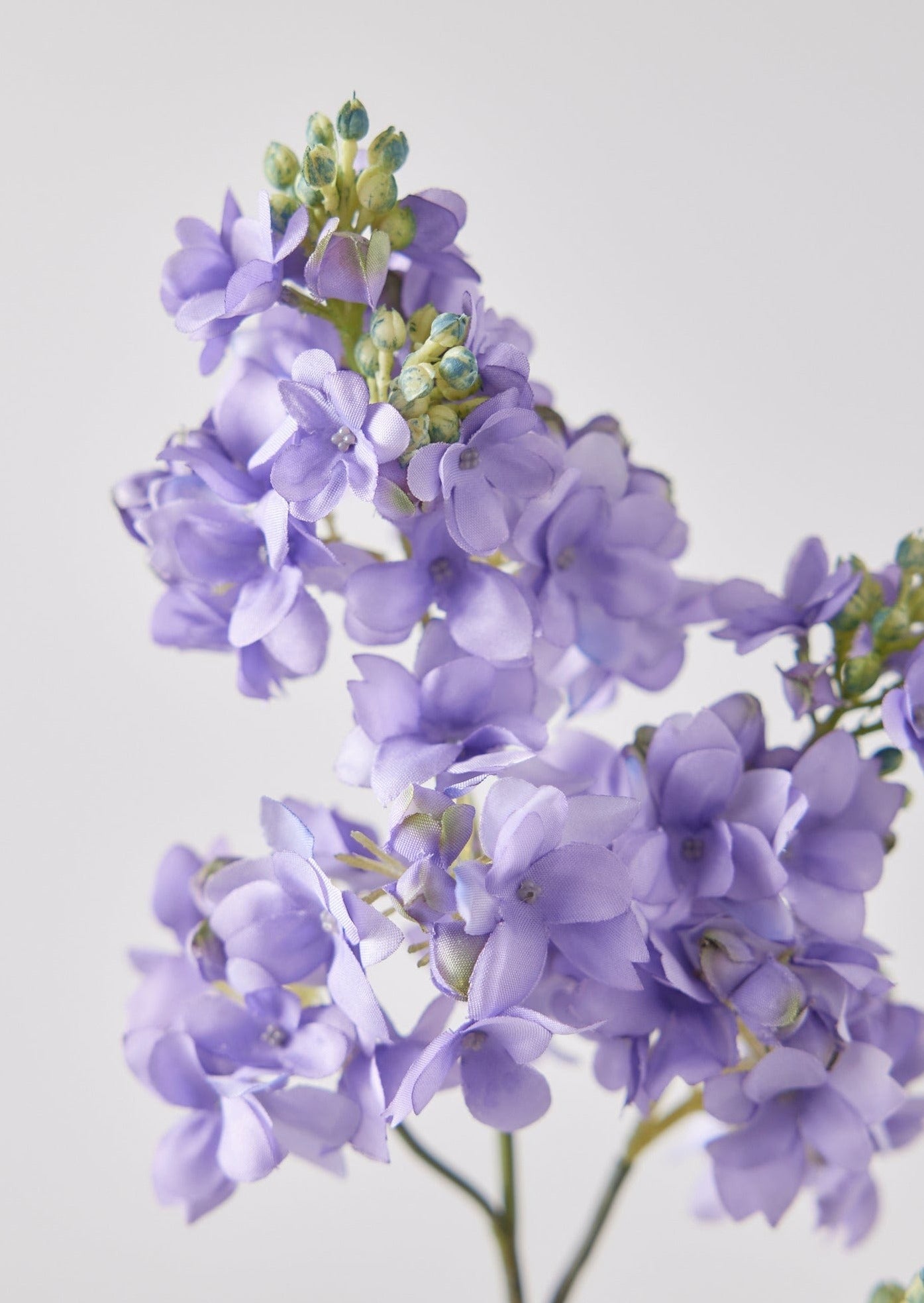 Closeup View of Afloral Faux Lilac Flowers in Lavender