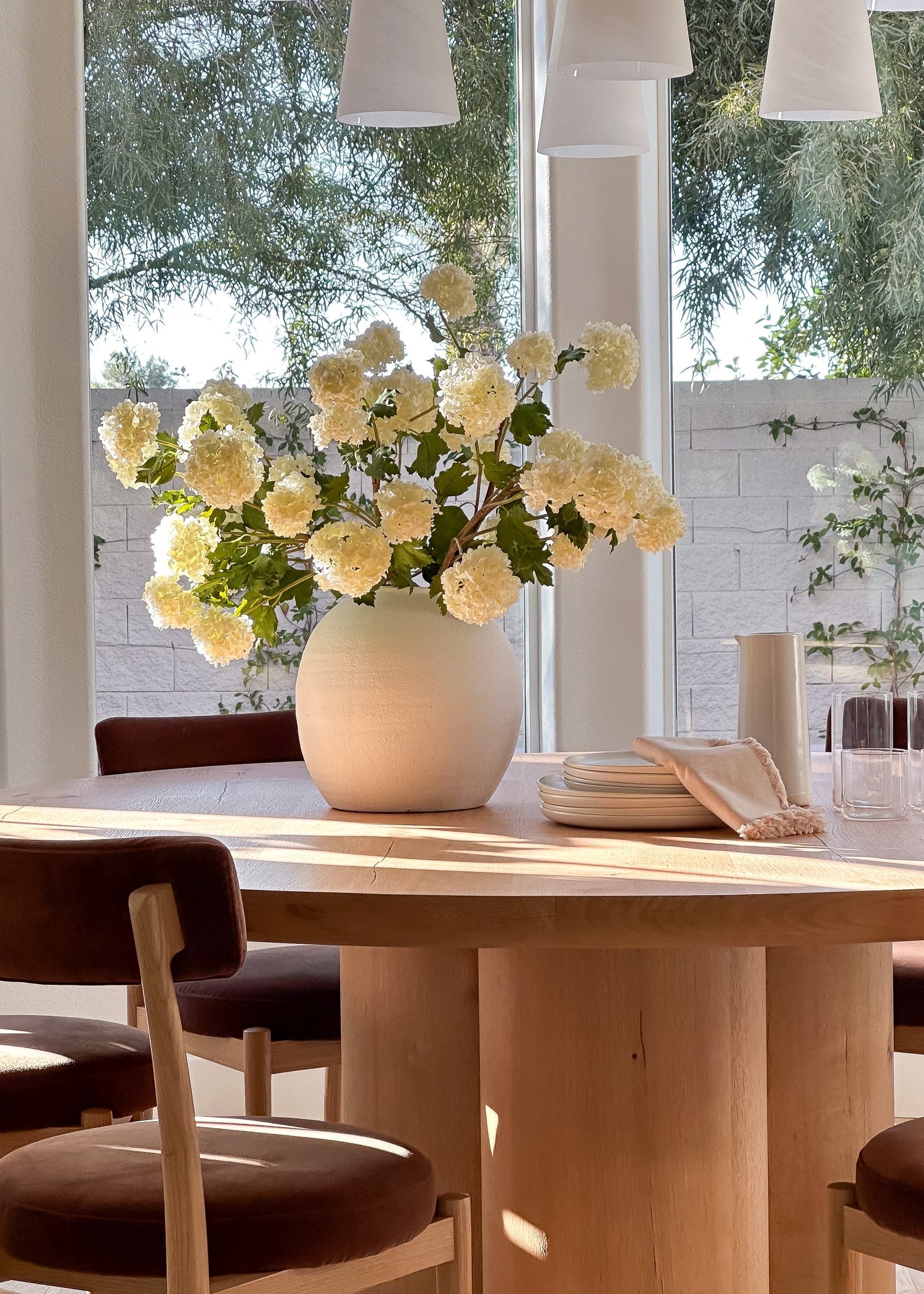 white flowers in white vase