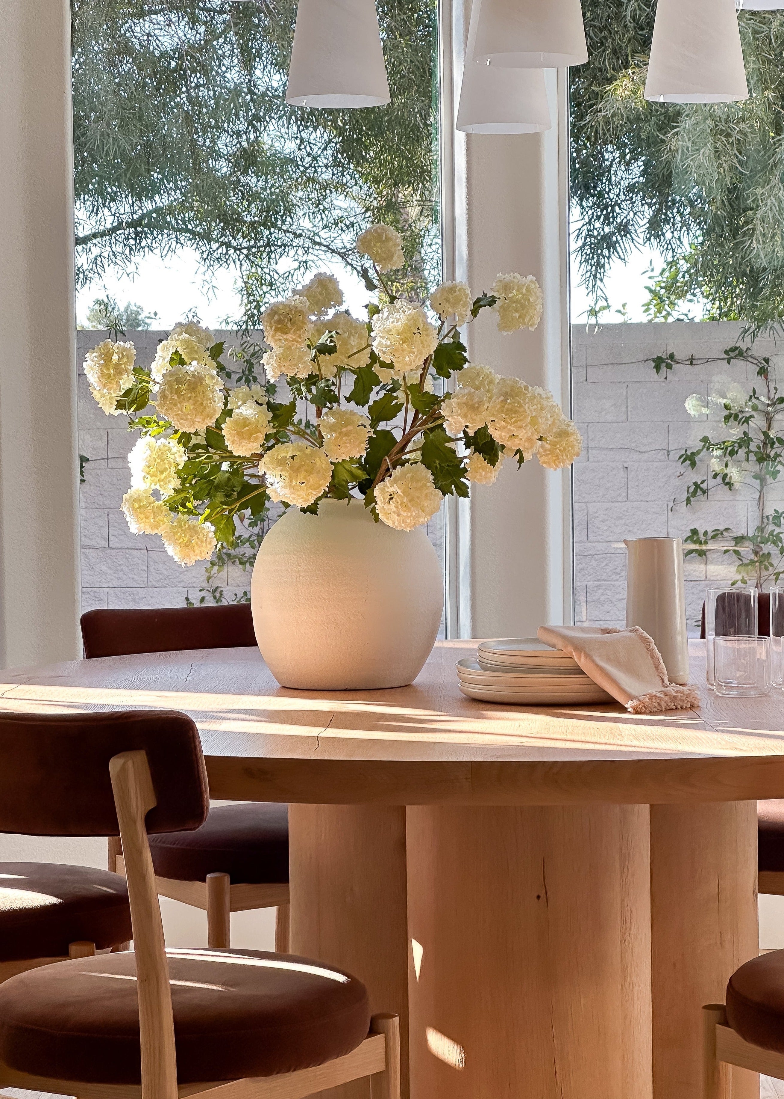 white flowers in white vase