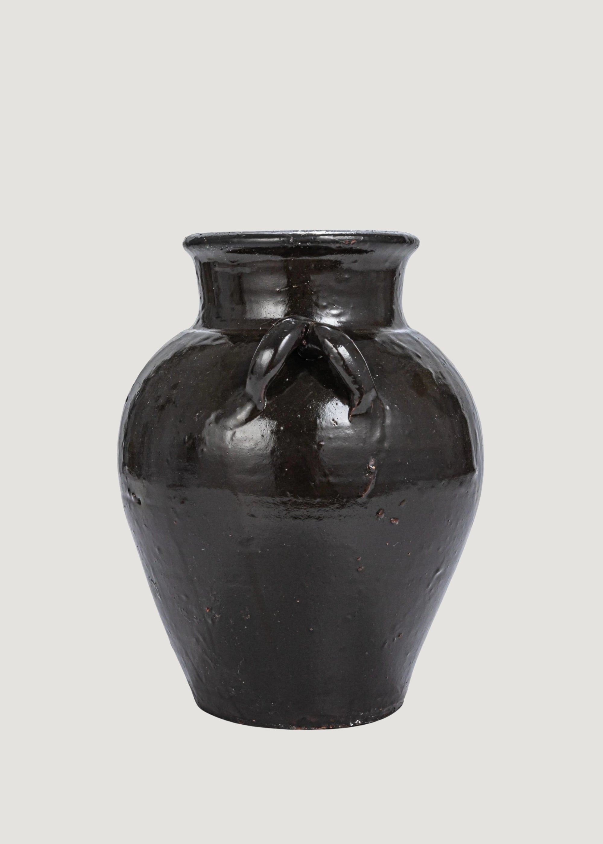 Handles of the Distressed Clay Jar Vase