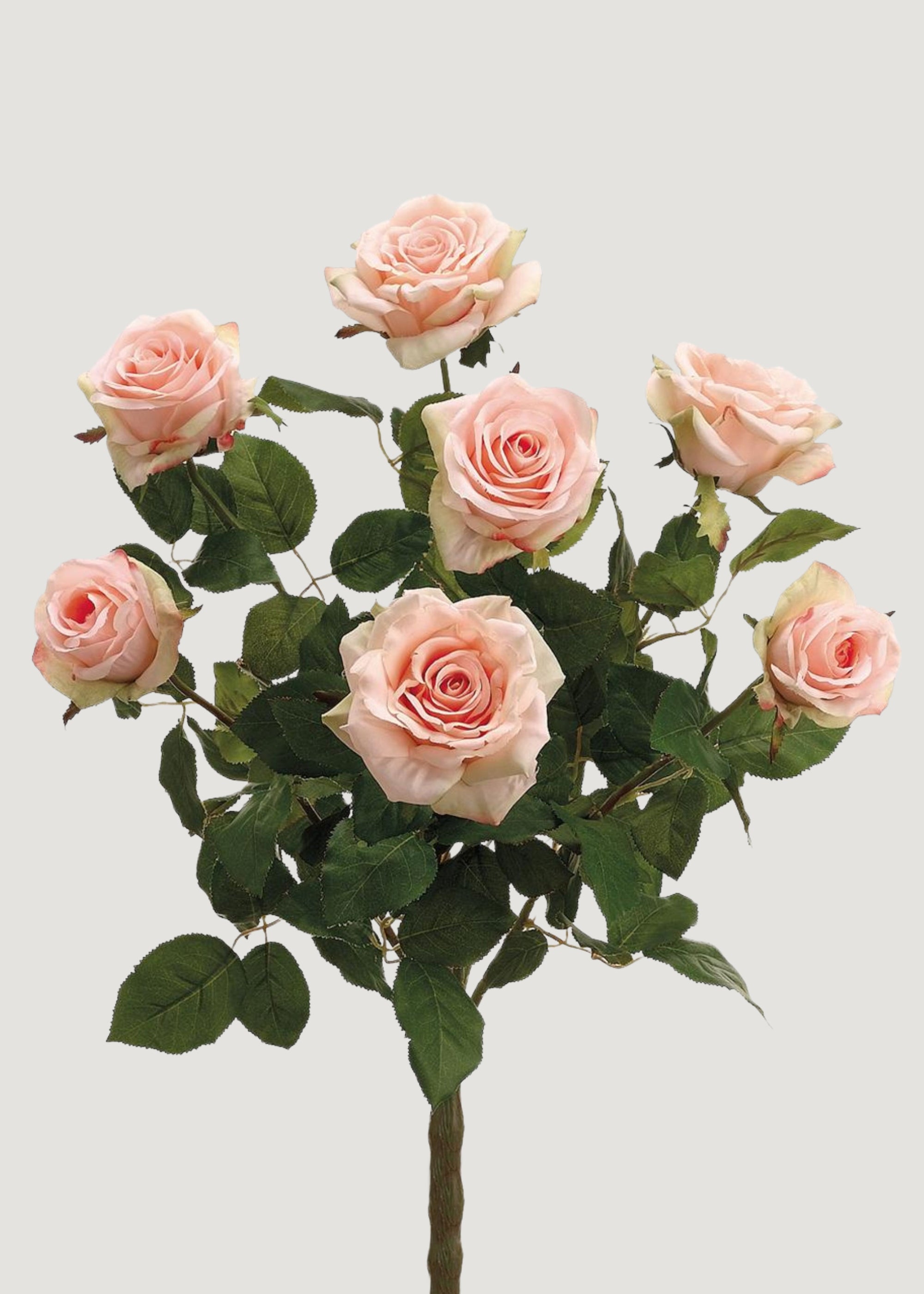 Artificial pink roses with green leaves