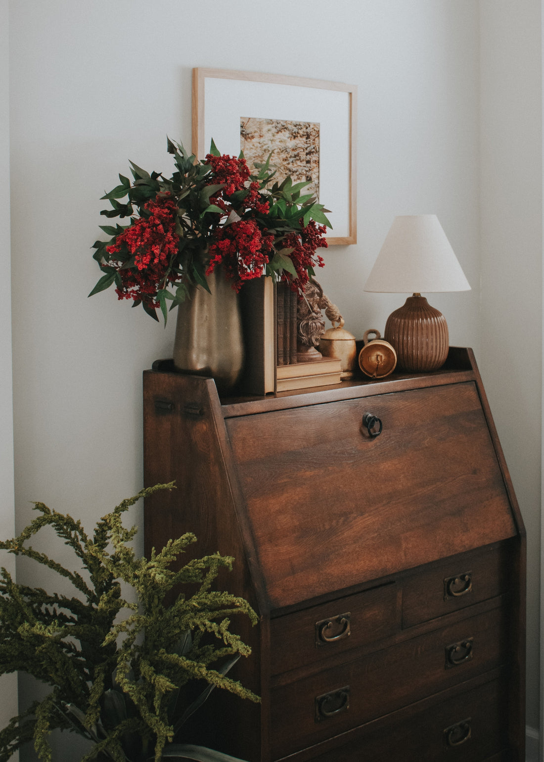 nandina berry and green seed berry stems arranged in vases