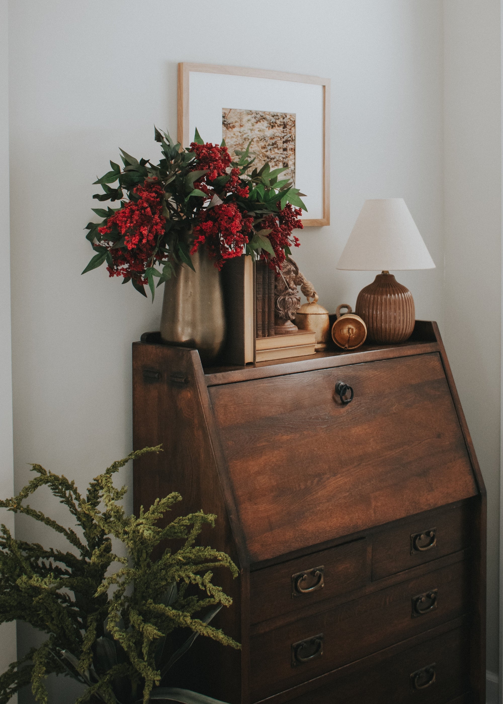 nandina berry and green seed berry stems arranged in vases