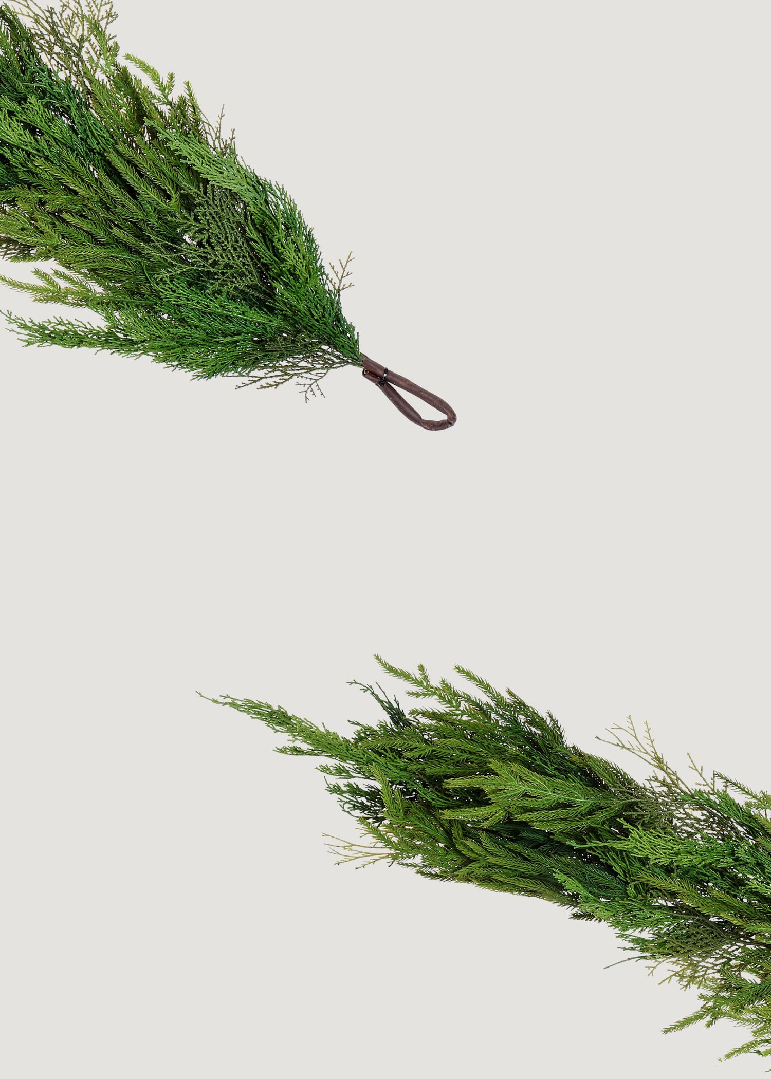 Ends of Artificial Cypress and Norfolk Pine Garland