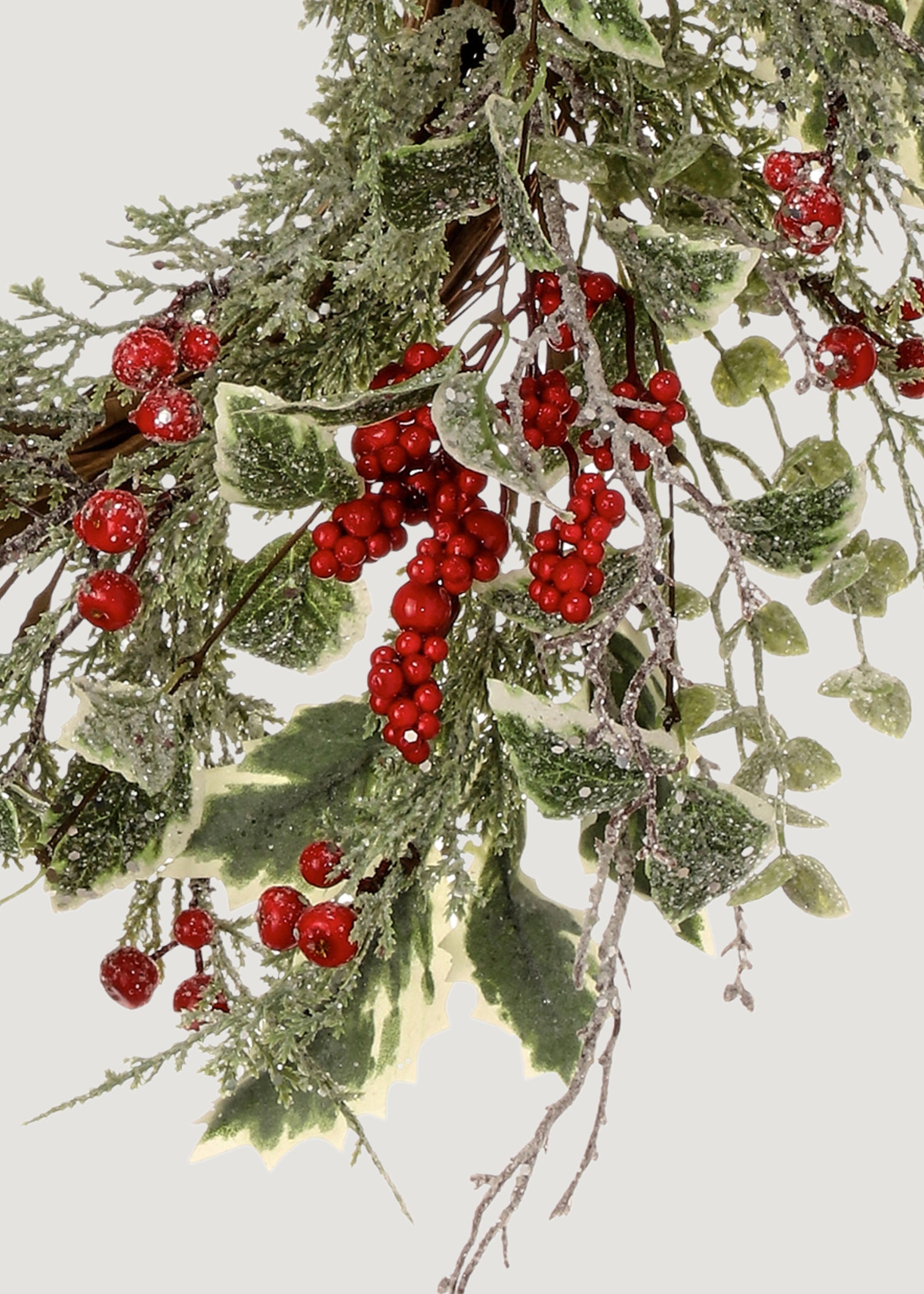 Close-up of Frosted Red Berry and Holly Wreath