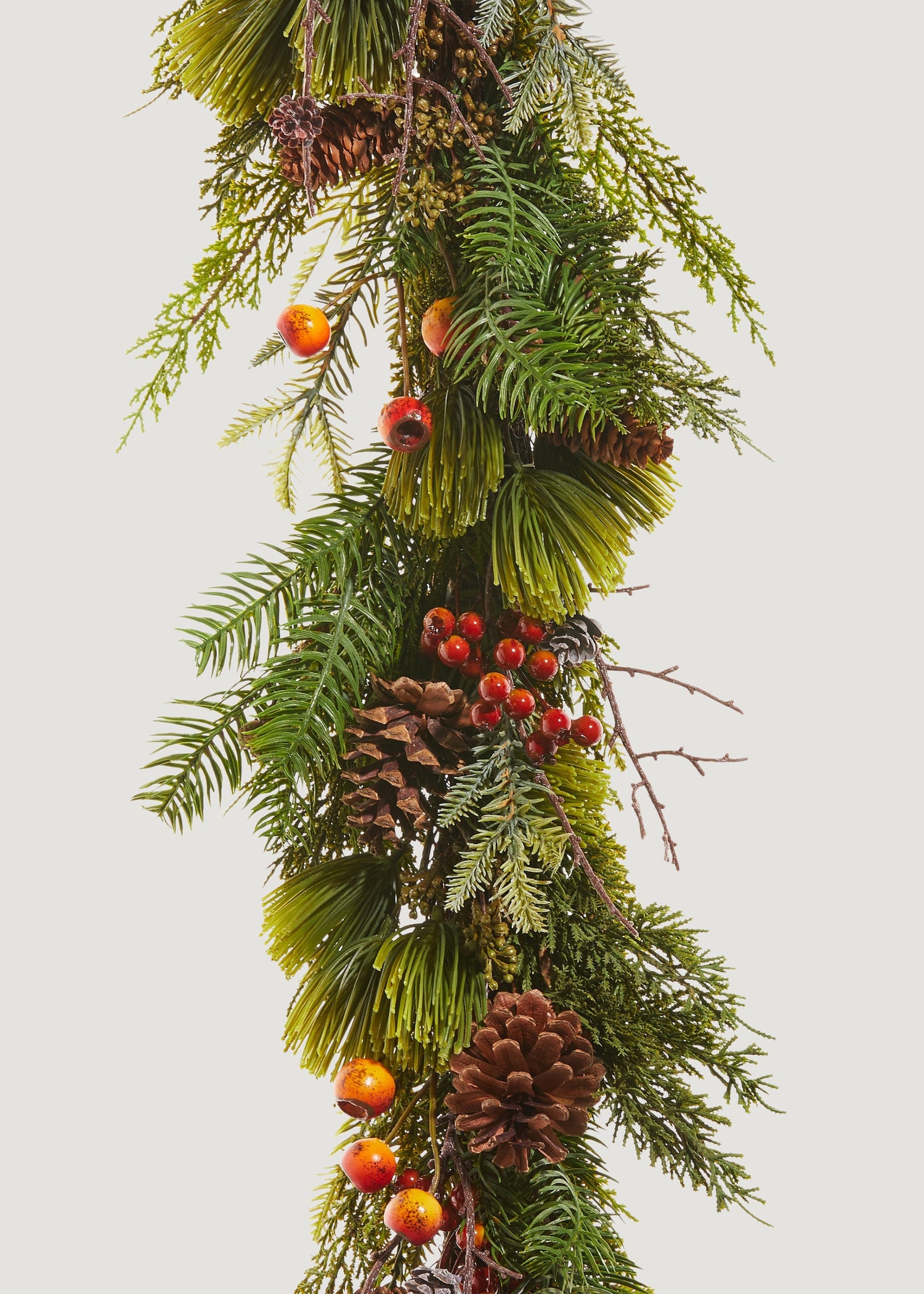 Close-up of Artificial Winter Greens and Berry Pod Garland