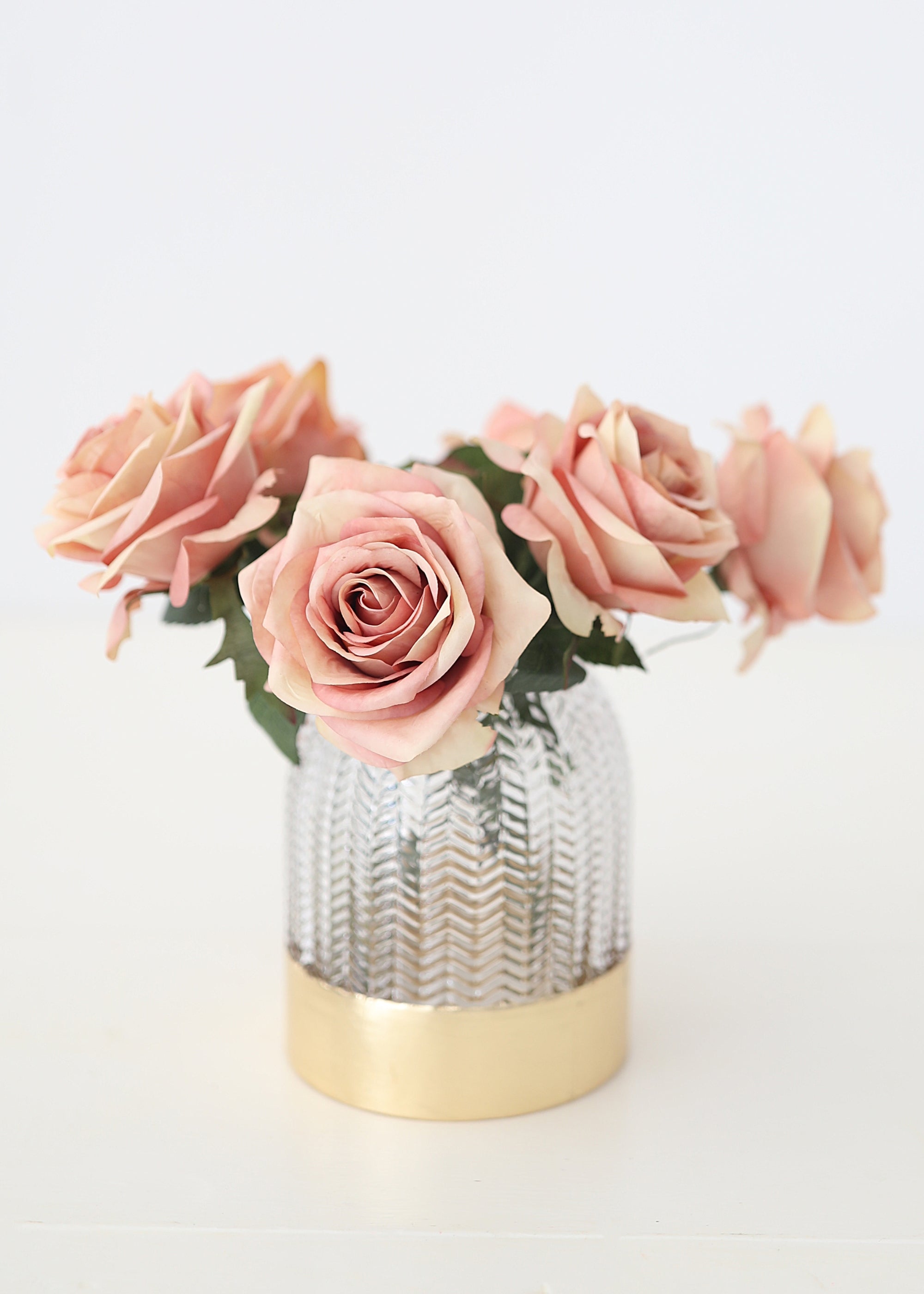 Vase with pink roses