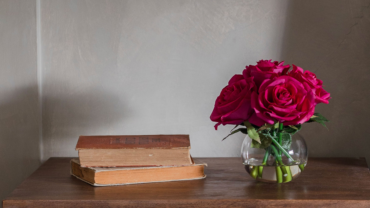 Dark pink faux rose arrangement table decor