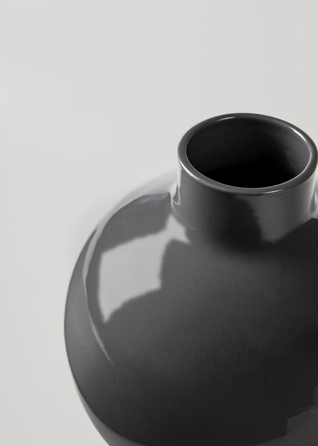 Close-up of the Afloral Ceramic Small Round Glossy Smoked Taupe Vase