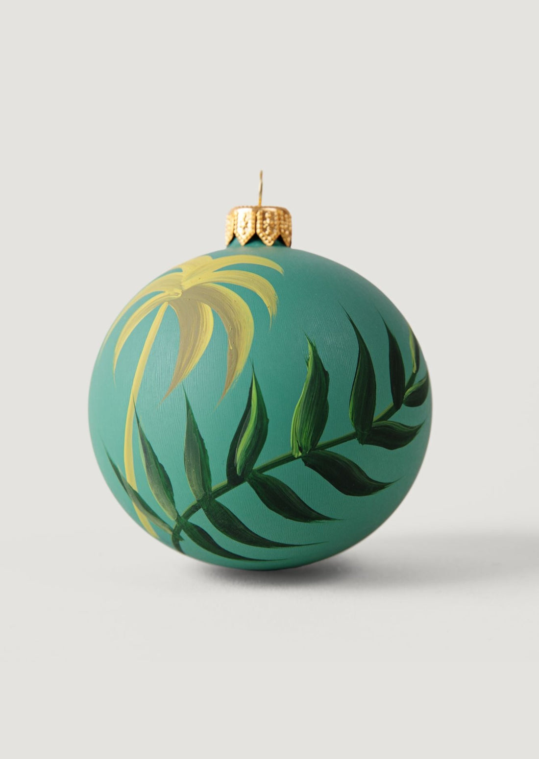 Glass Bulb Ornament with Hand-Painted Green Palm Leaf Design
