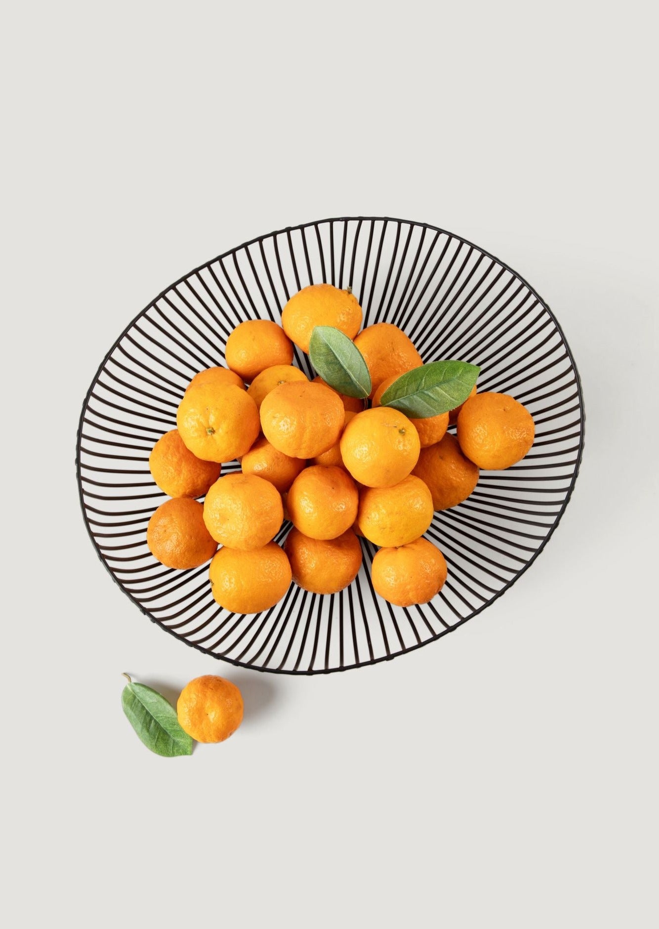 Top View of Iron Metal Oval Basket with Oranges