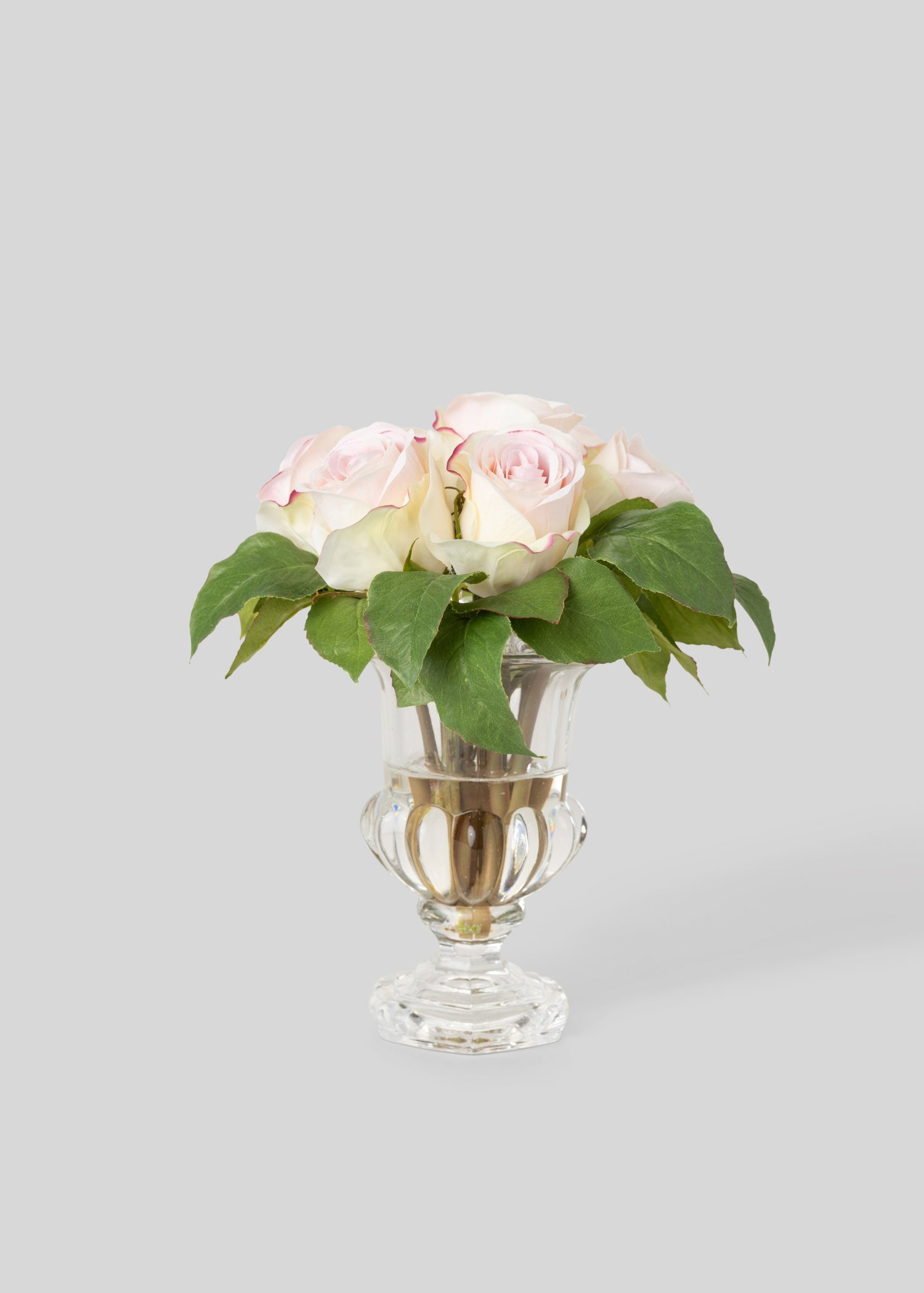 Artificial Soft Pink Roses in a Glass Vase