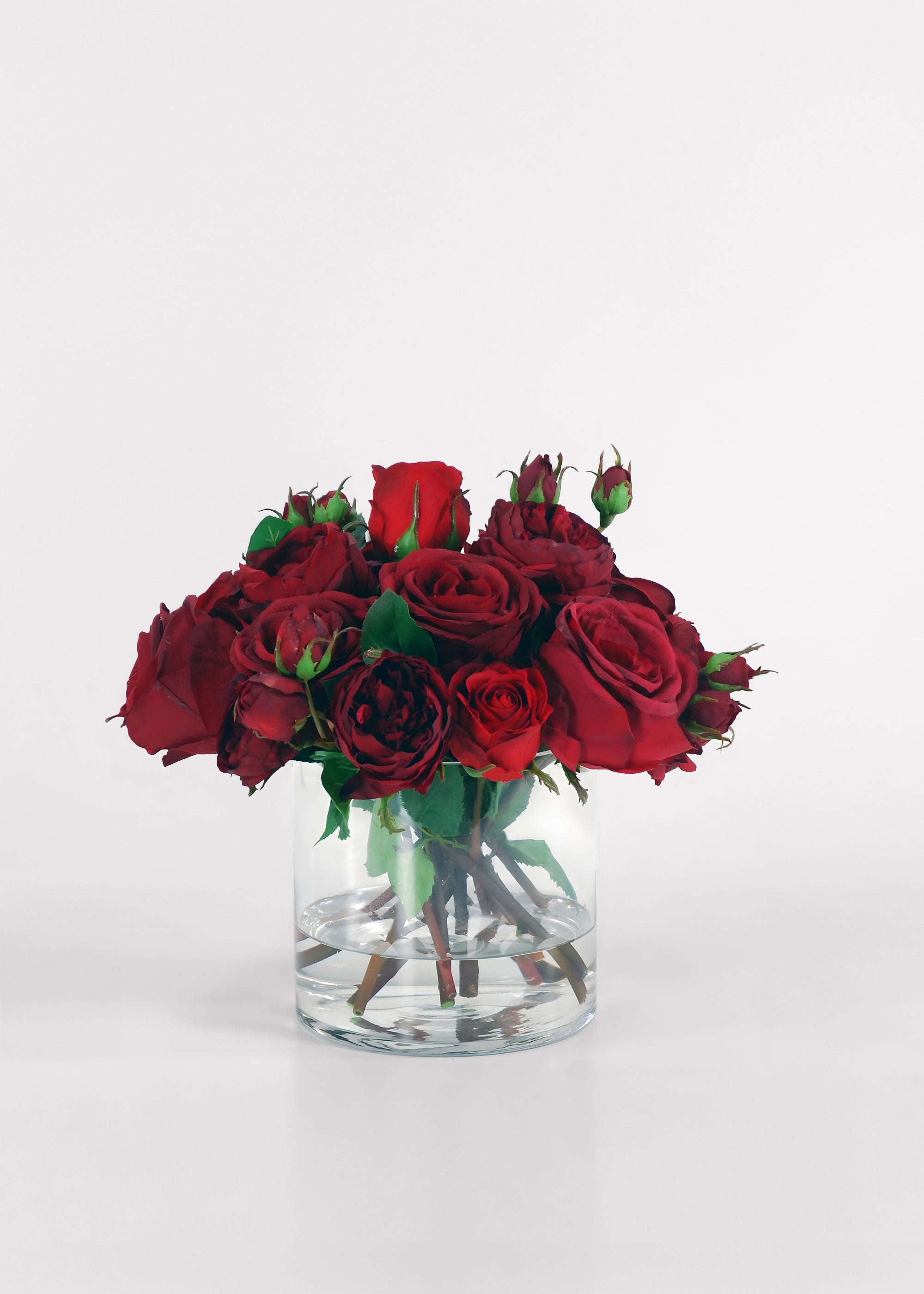 Faux Arrangement of Red Roses in Glass Vase