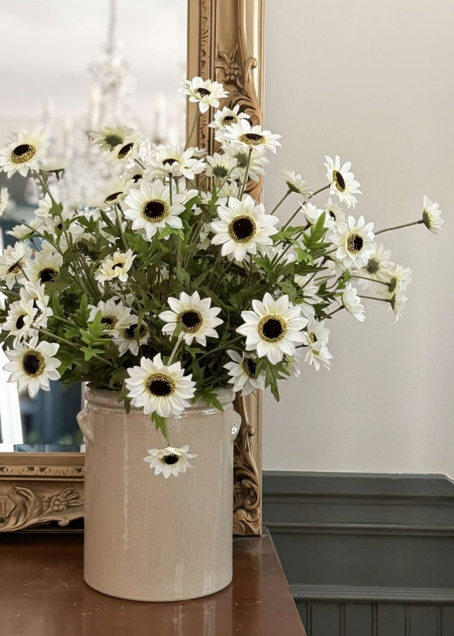 faux Black-eyed Susans styled in a stoneware crock