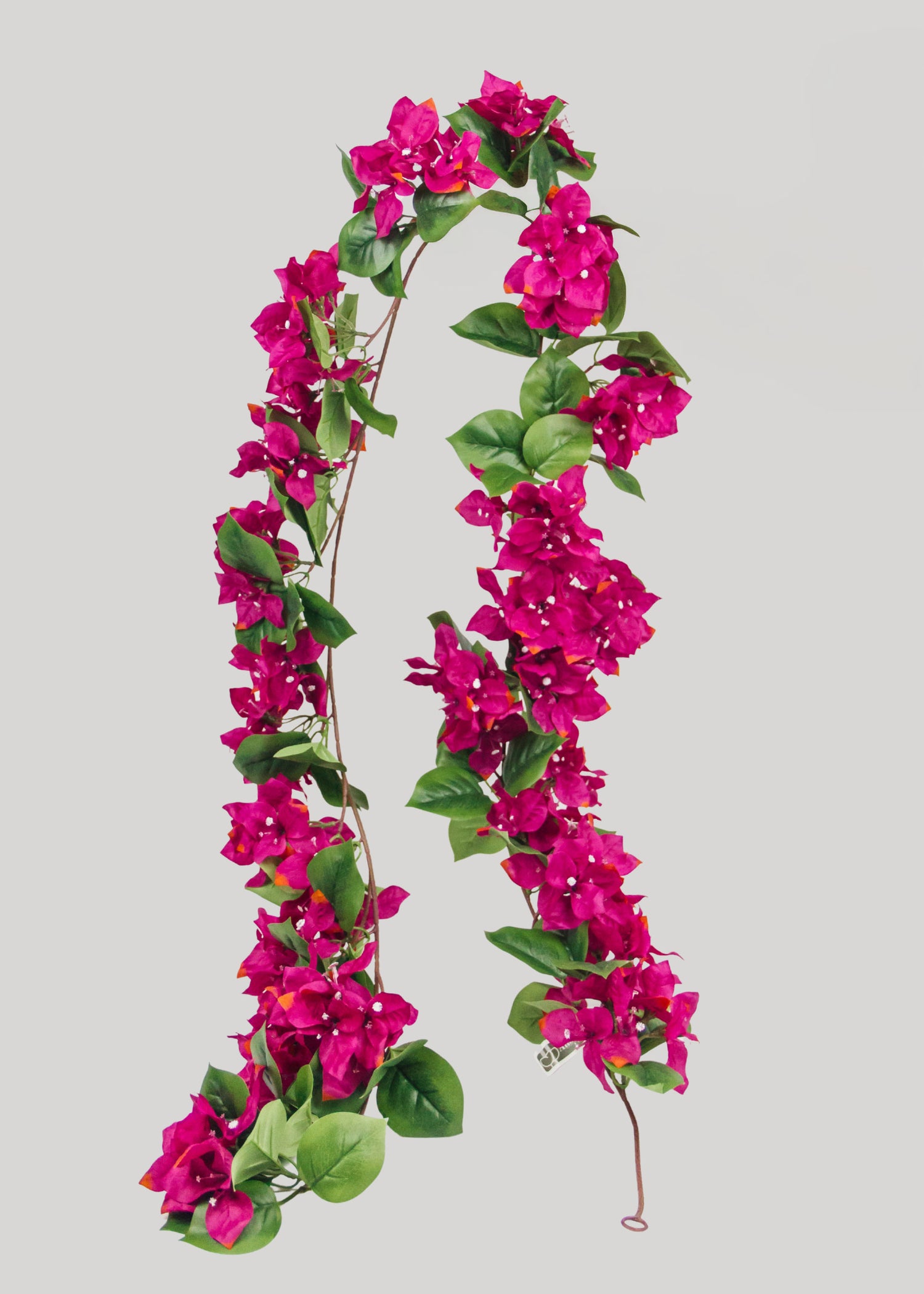 Artificial bougainvillea garland with pink flowers and green leaves
