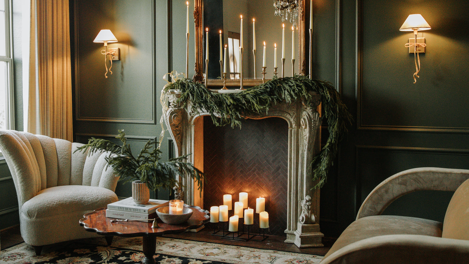 afloral norfolk pine garland styled on fireplace mantle