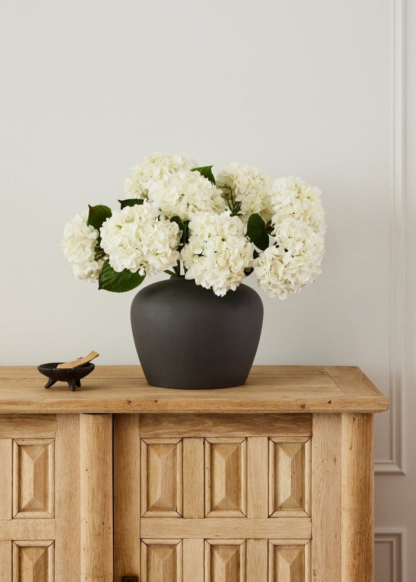 Large Slate Vase Styled with Faux Talc Hydrangeas at afloral