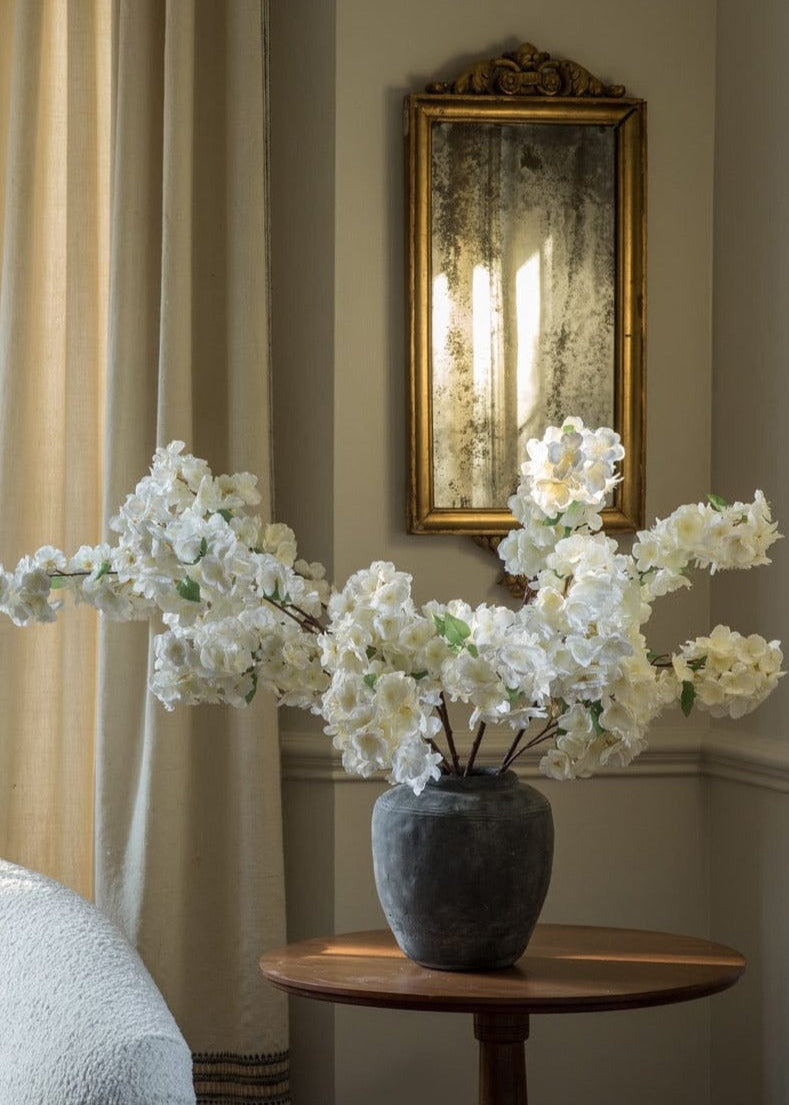 Fake Cherry Blossoms in Concrete Vase at Afloral
