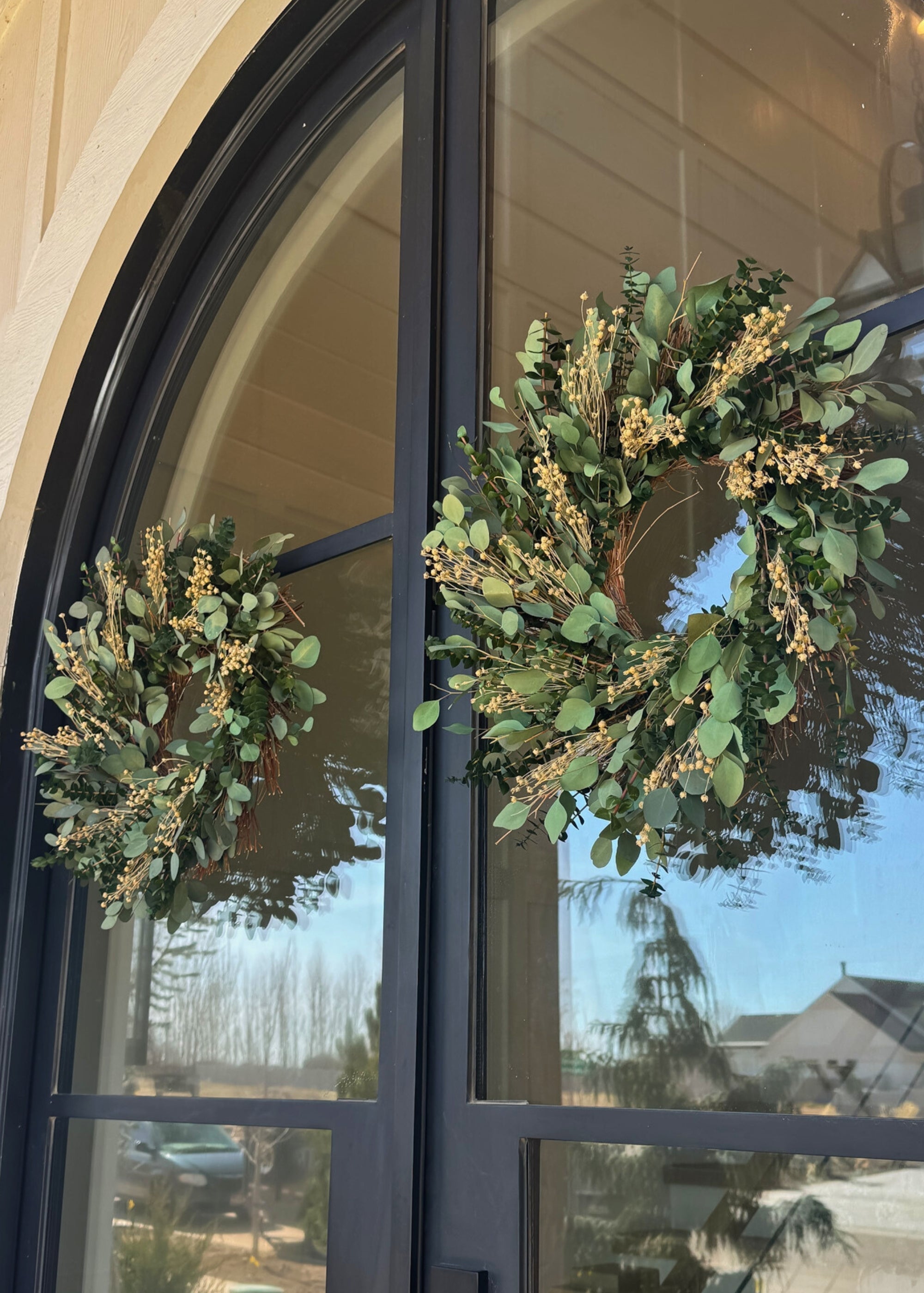 dried and preserved front door wreath