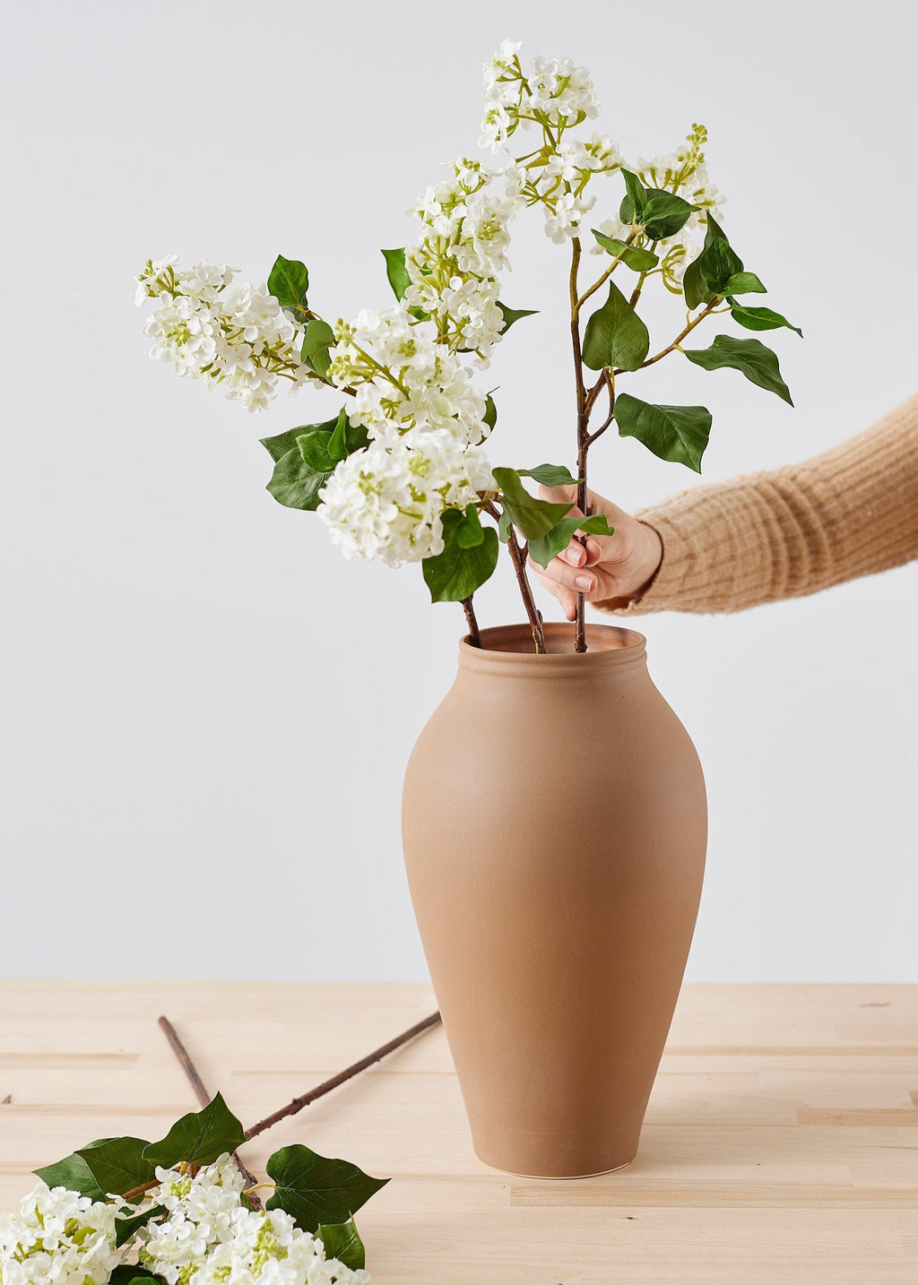  hairpin flower frog arrangement with faux lilacs from afloral