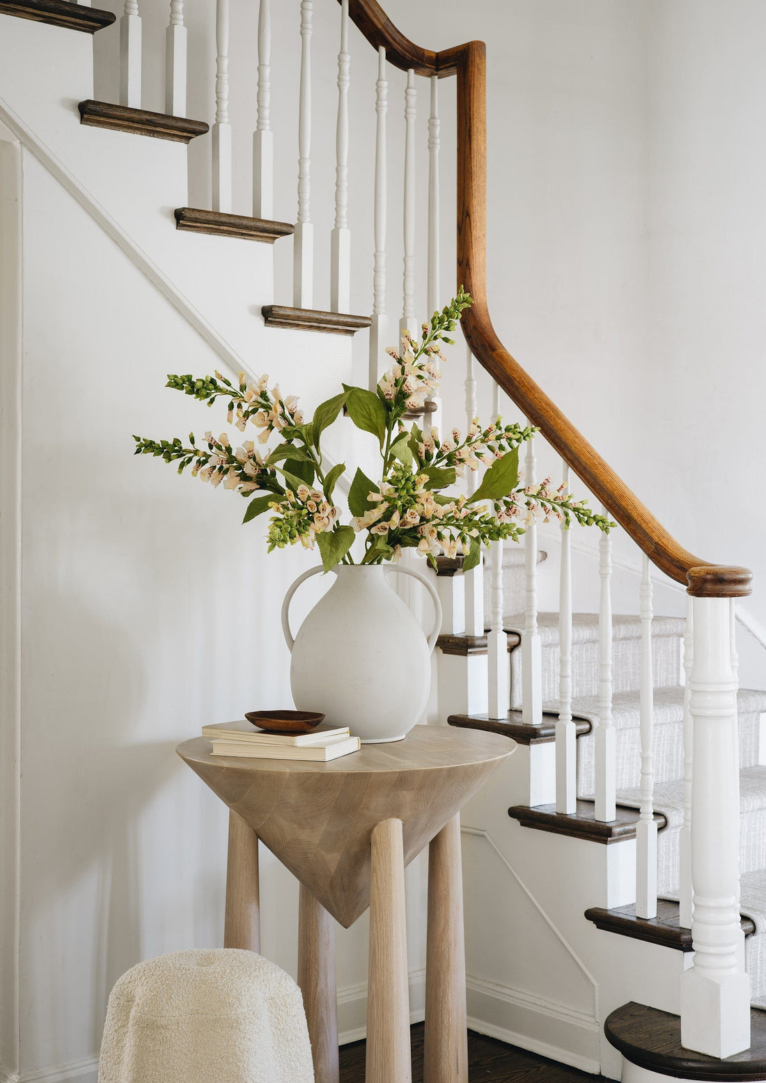 artificial flowers in styled foxglove arrangement