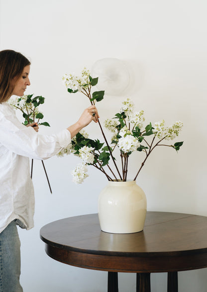 Faux Lilacs Inserted in Chicken Wire for Vase Arrangement