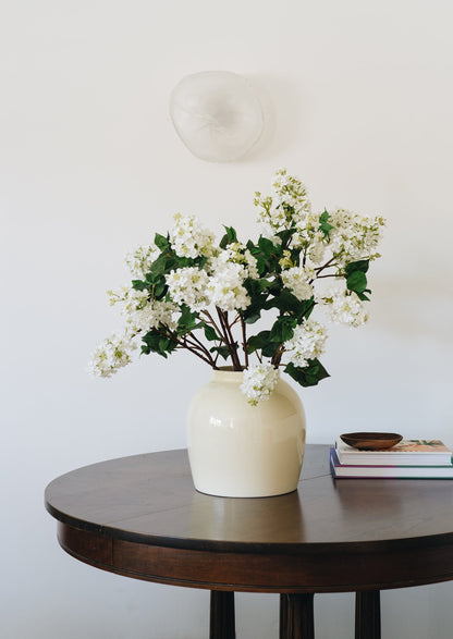 White Faux Lilacs Arranged in Vase with Chicken Wire