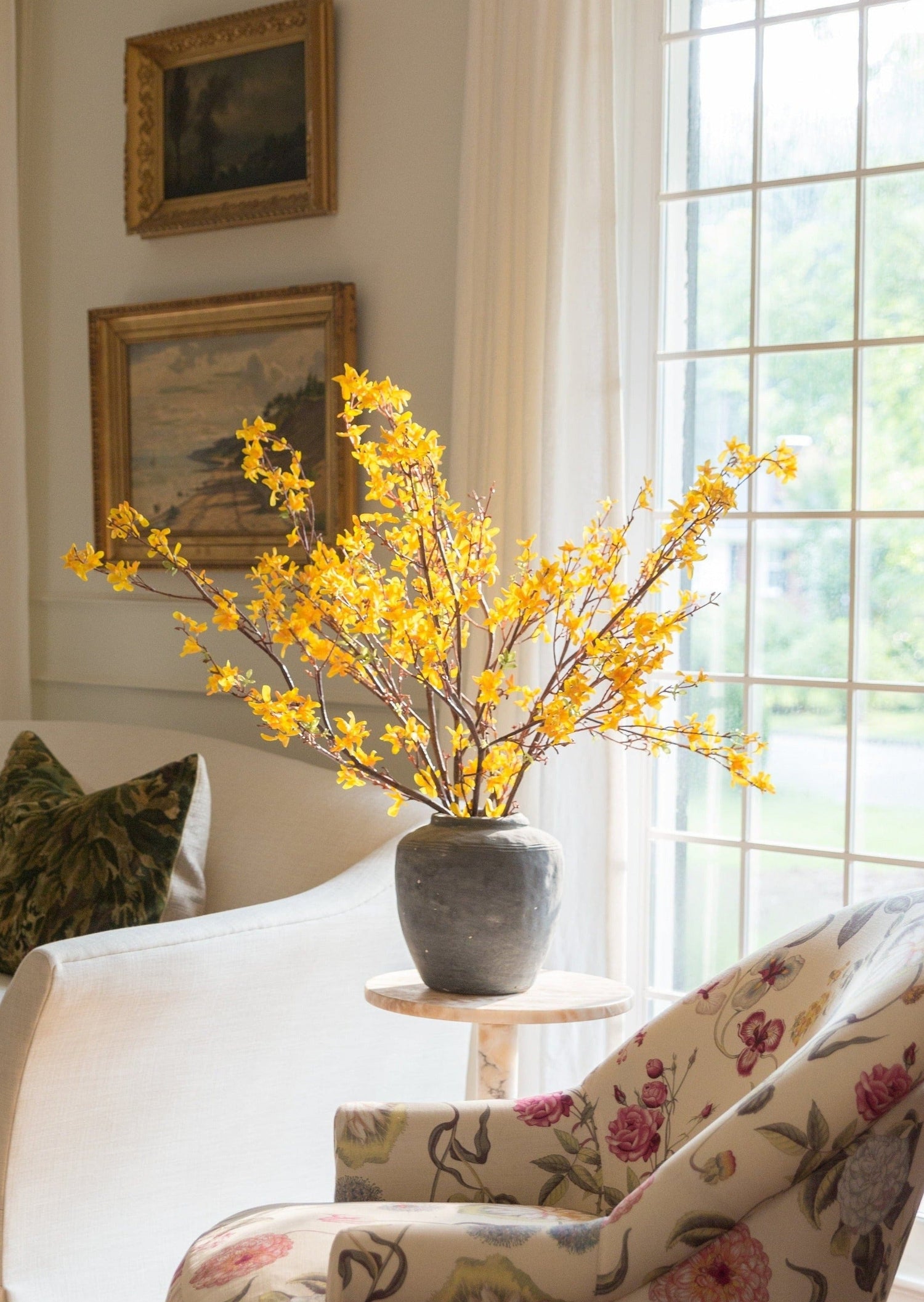 spring artificial stems in yellow forsythia branches