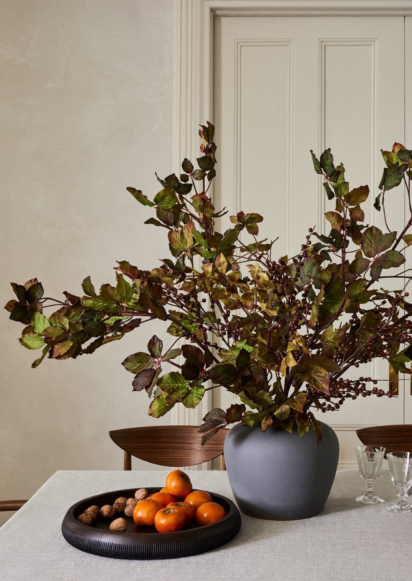 Faux Ilex Berry Branches Styled with Chestnut Branches in Slate Vase