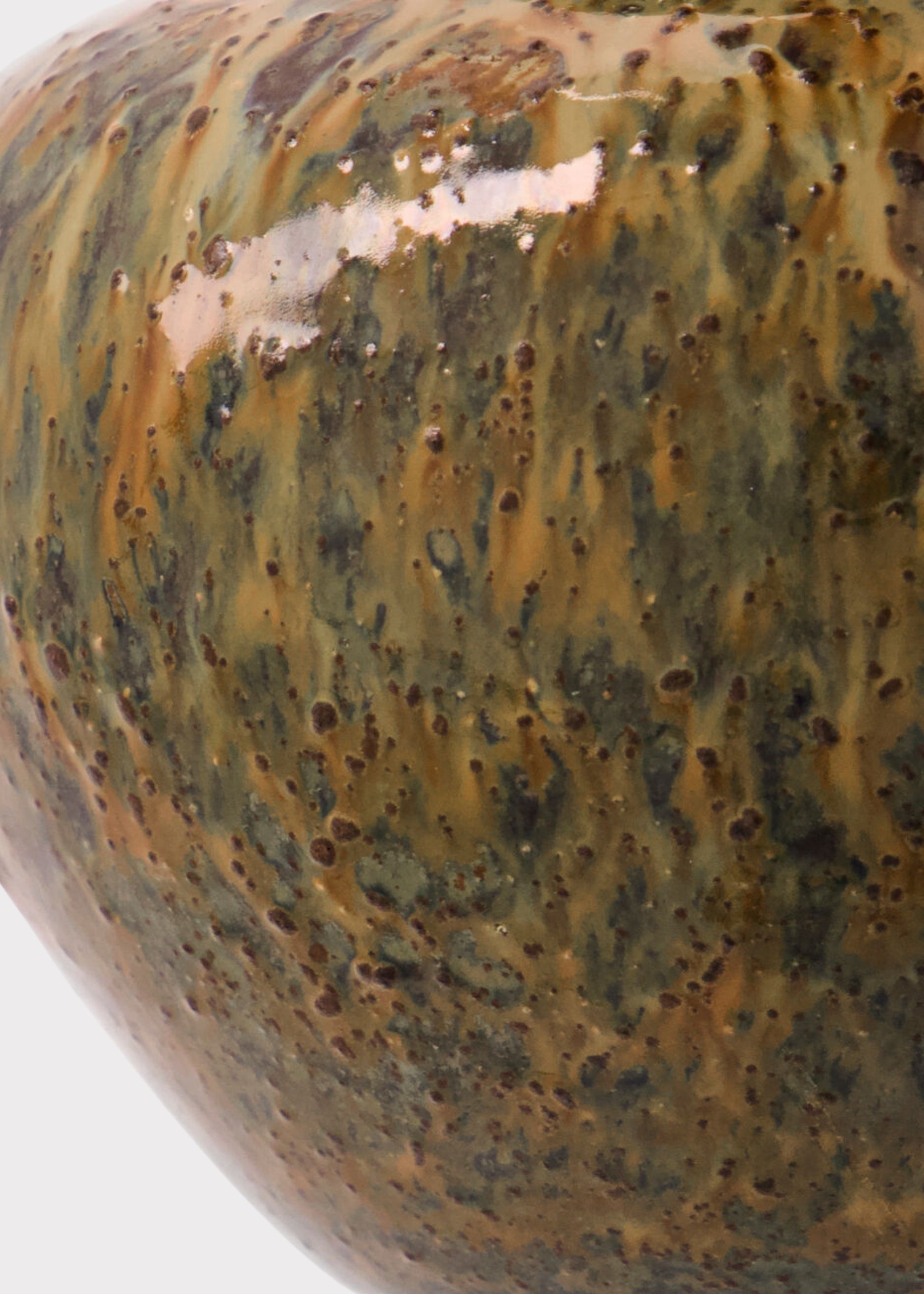 Close-up of a Handmade Ceramic Bud Vase in Warm Brown Glaze 