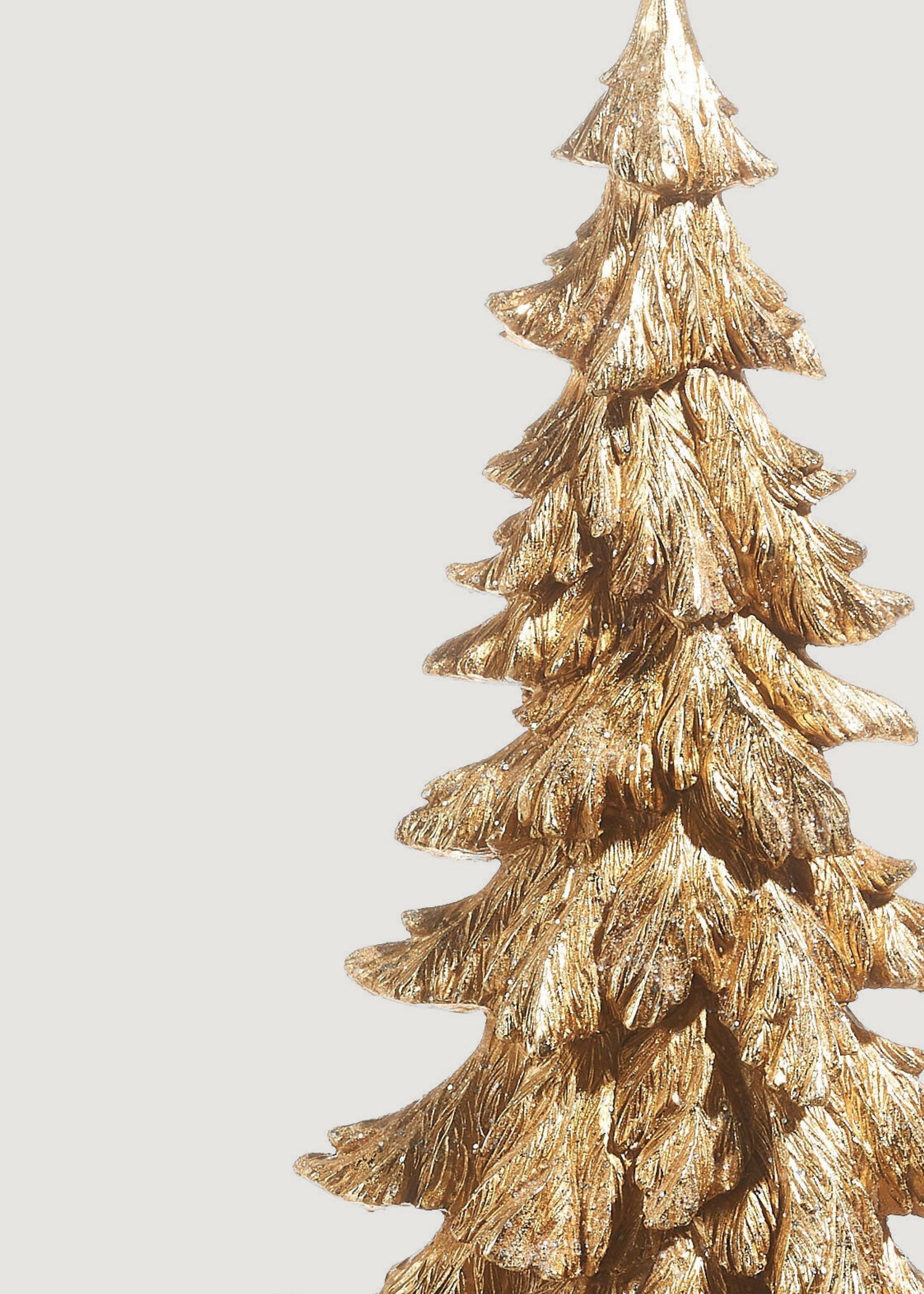 Close-up of Gold Resin Christmas Tree