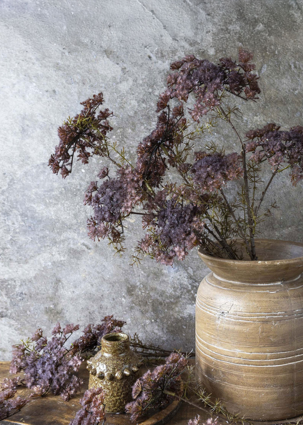 arrangement of faux purple queen anne's lace flowers