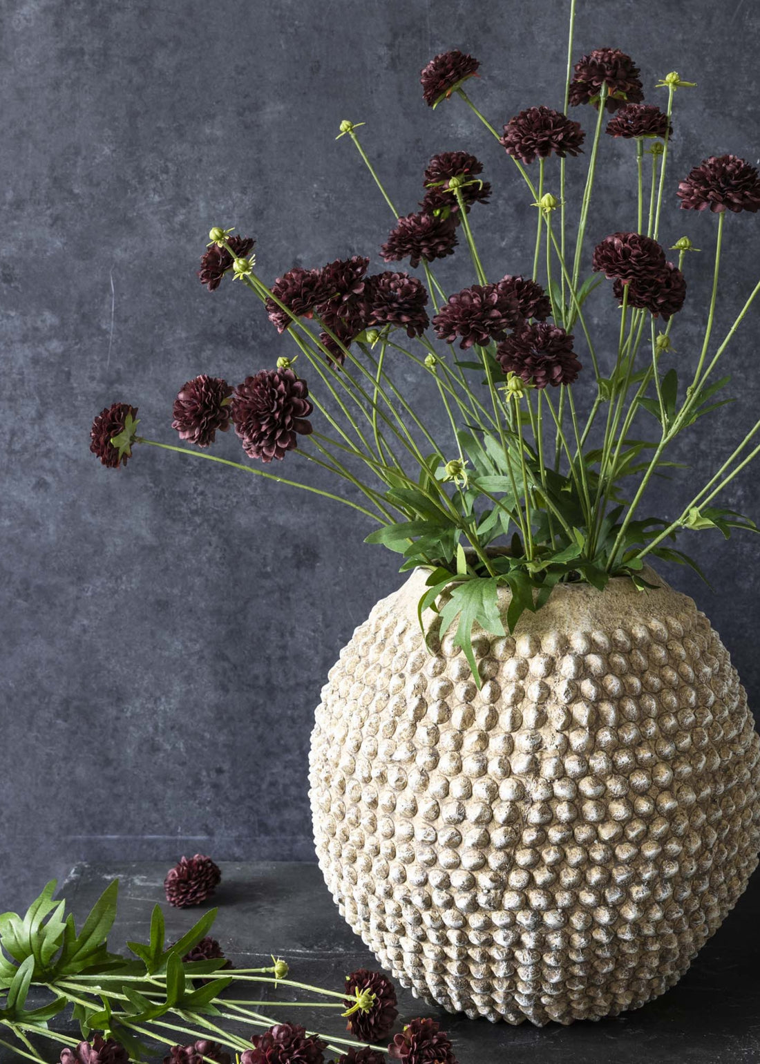 arrangement of faux purple cloves