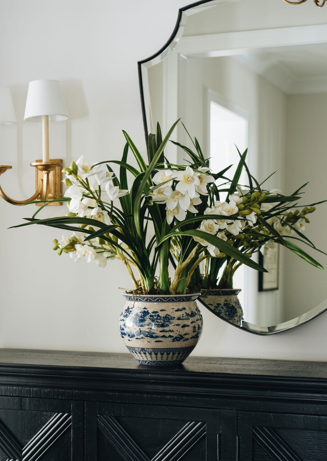 luxe artificial botanicals arrangement of faux white potted orchids