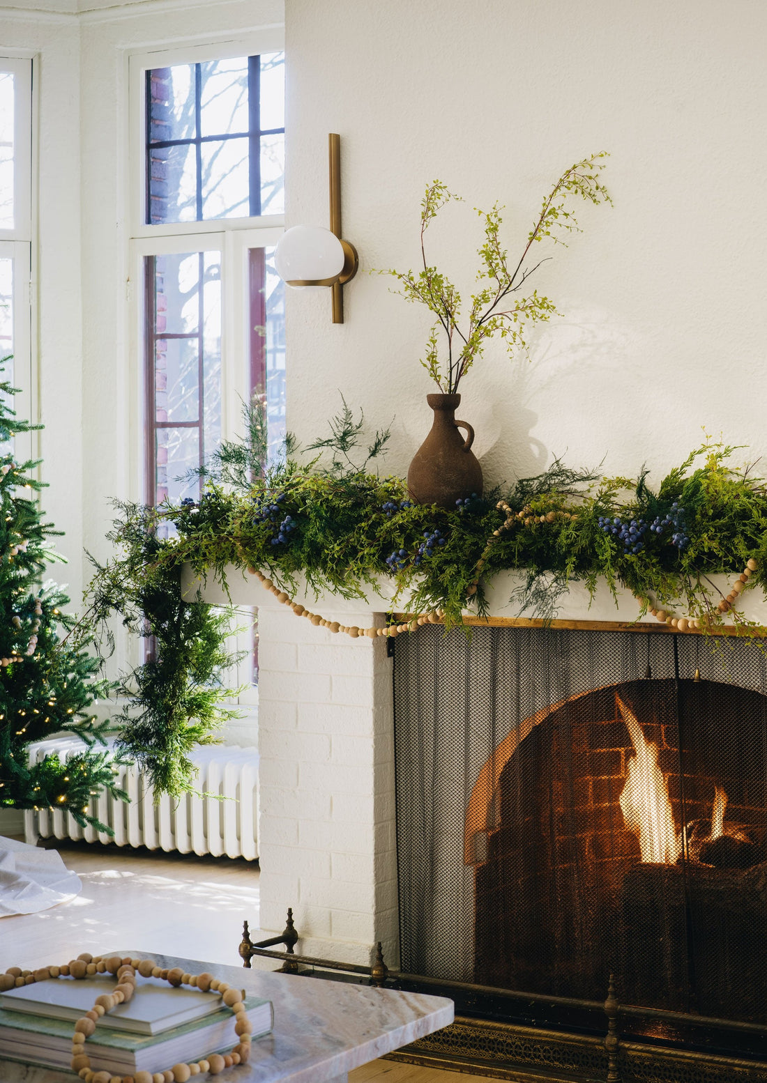 Mantel Decorated with Artificial Garlands and Blueberries