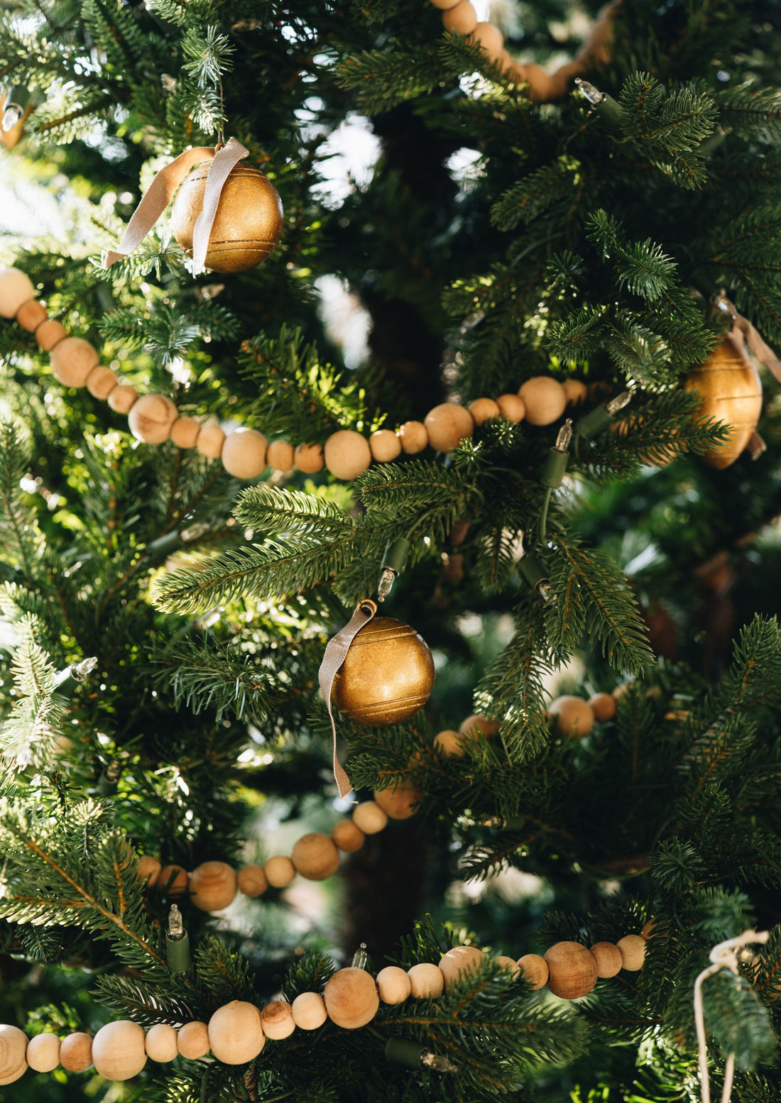 Close-up of Wood Bead Garland on Christmas Tree
