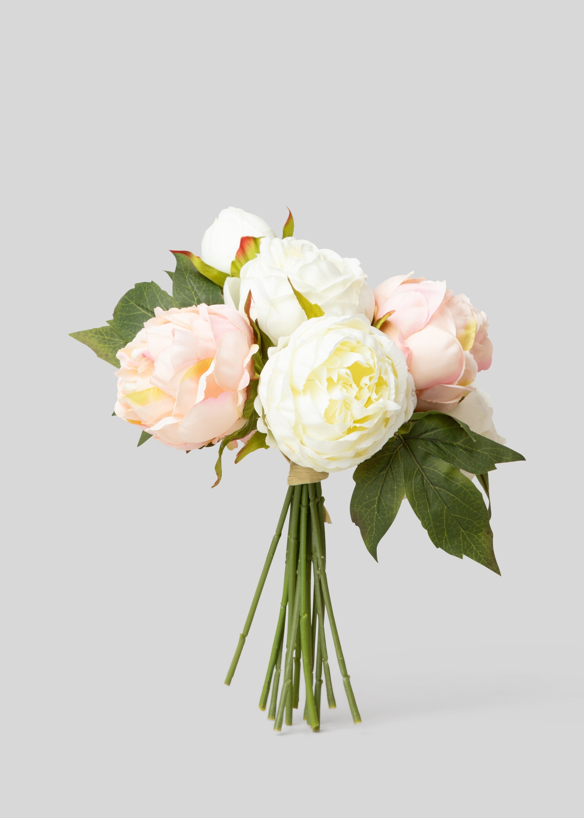 Bouquet of pink and white flowers on a gray background
