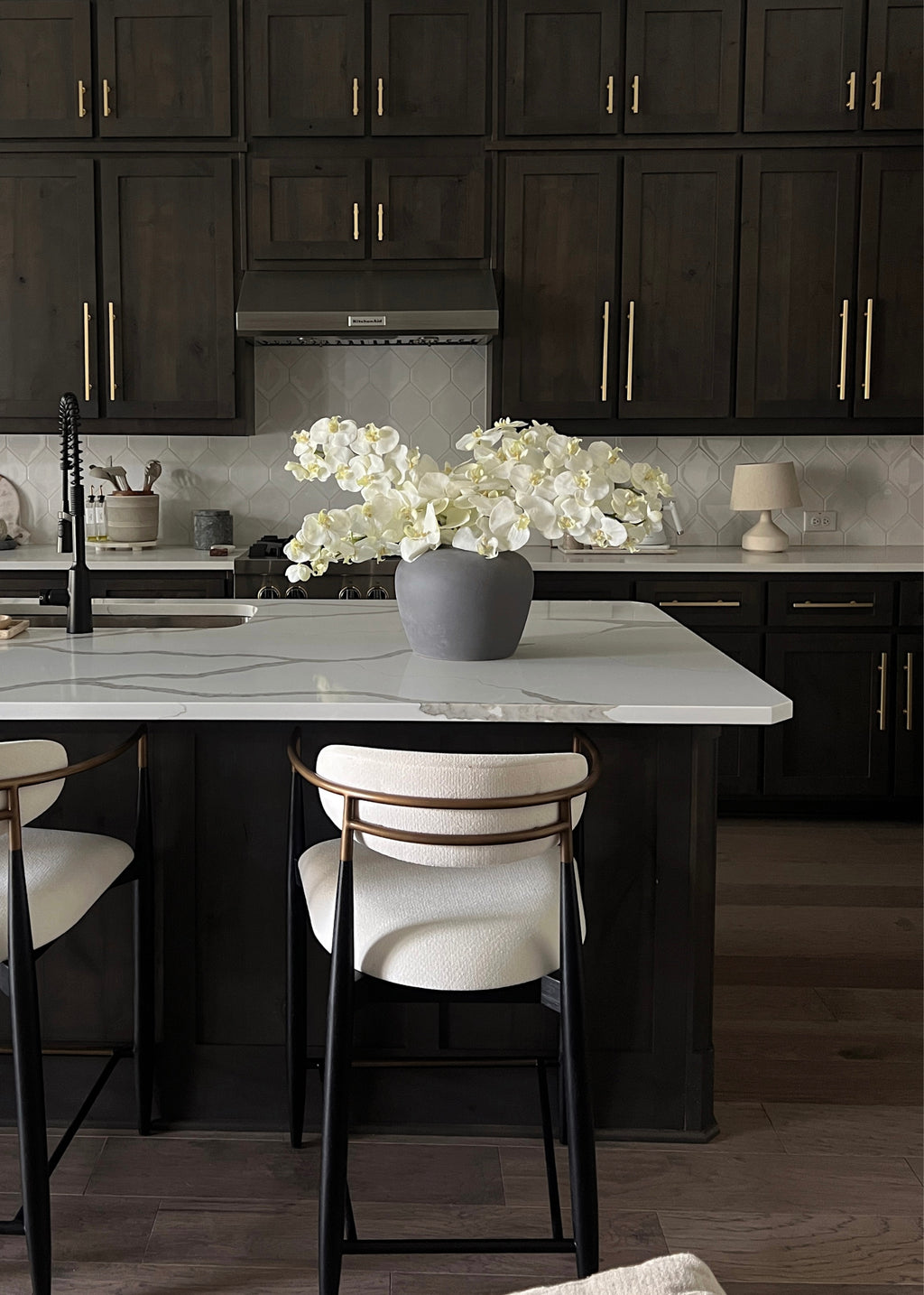 Styled Cream Orchids in a Kitchen