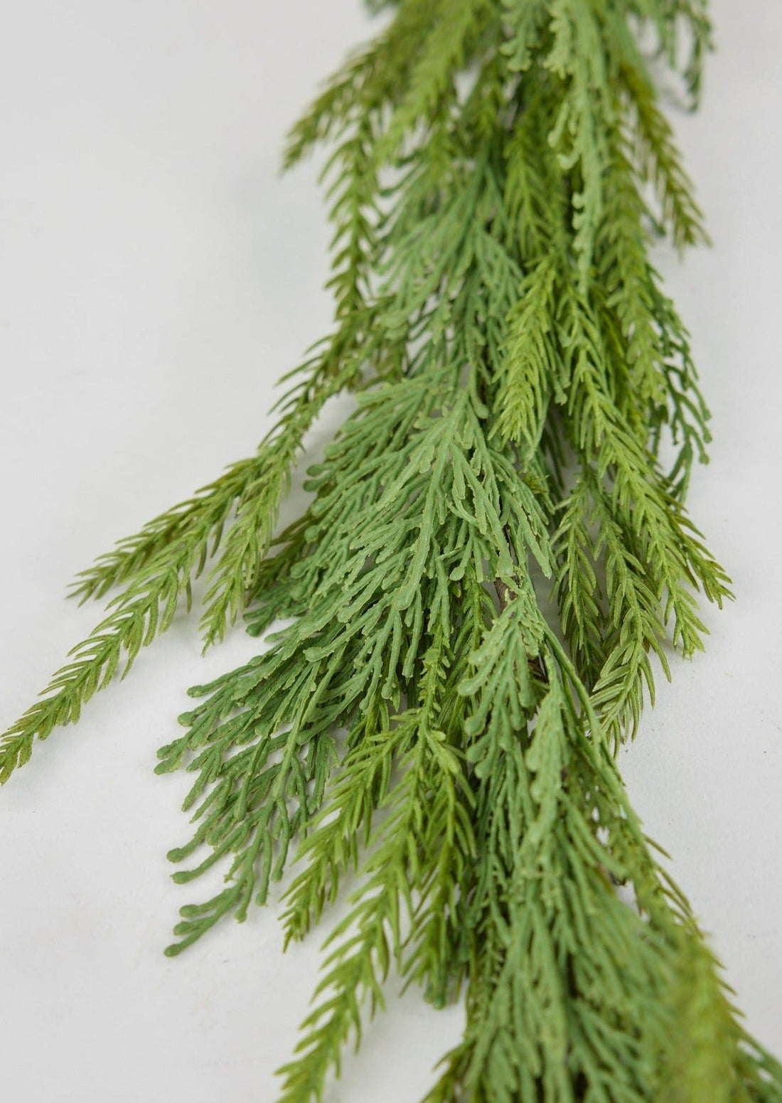 Closeup of Faux UV Treated Cedar Pine Winter Greenery Garland at Afloral