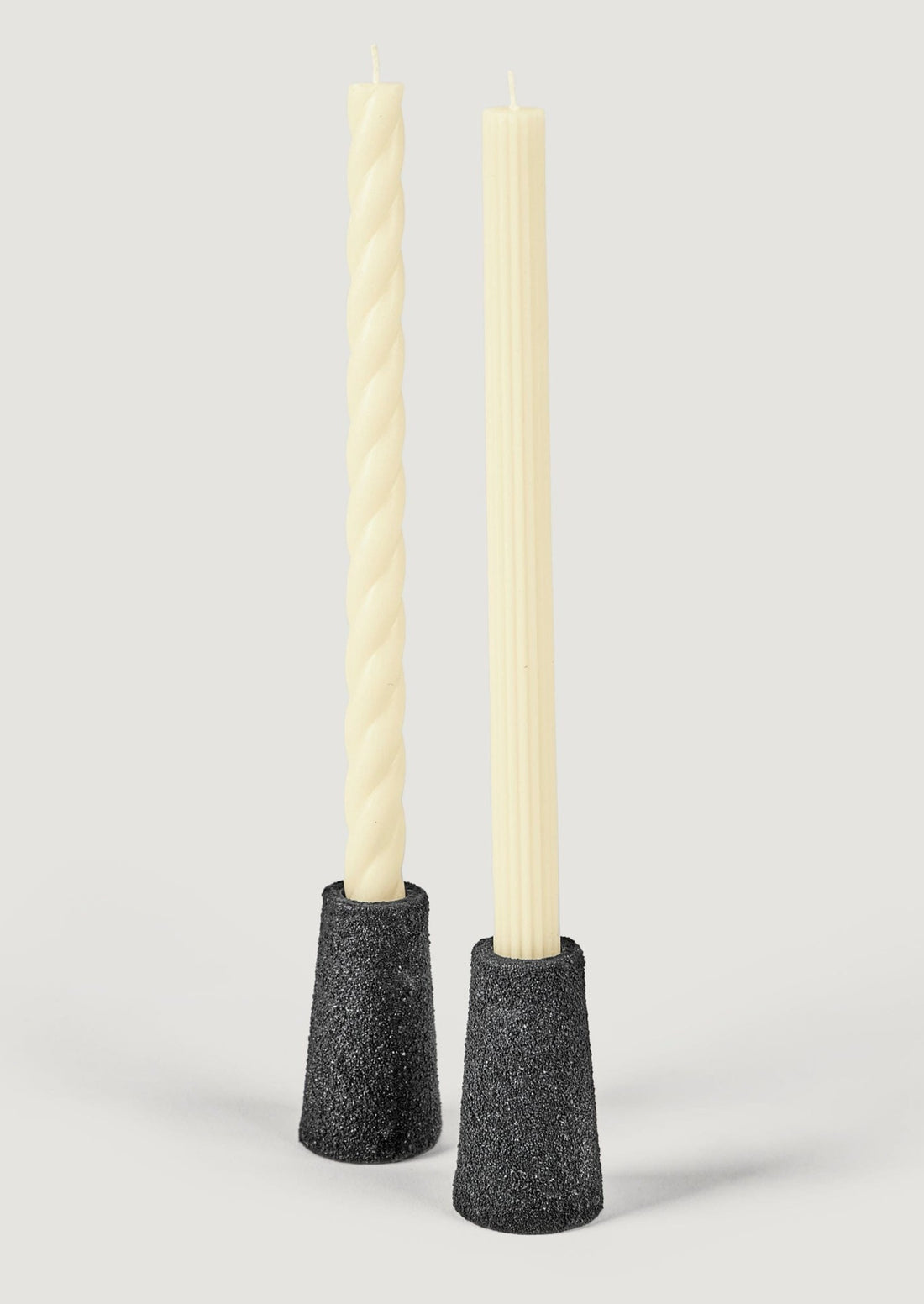 Black Pumice Taper Candle Holders Styled with Cream Candles at Afloral