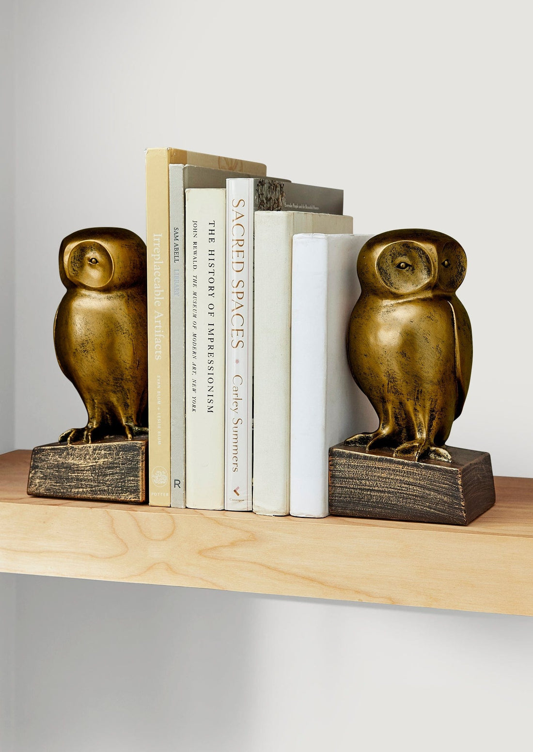 Bronze Owl Bookends Styled with Books on Shelf at Afloral