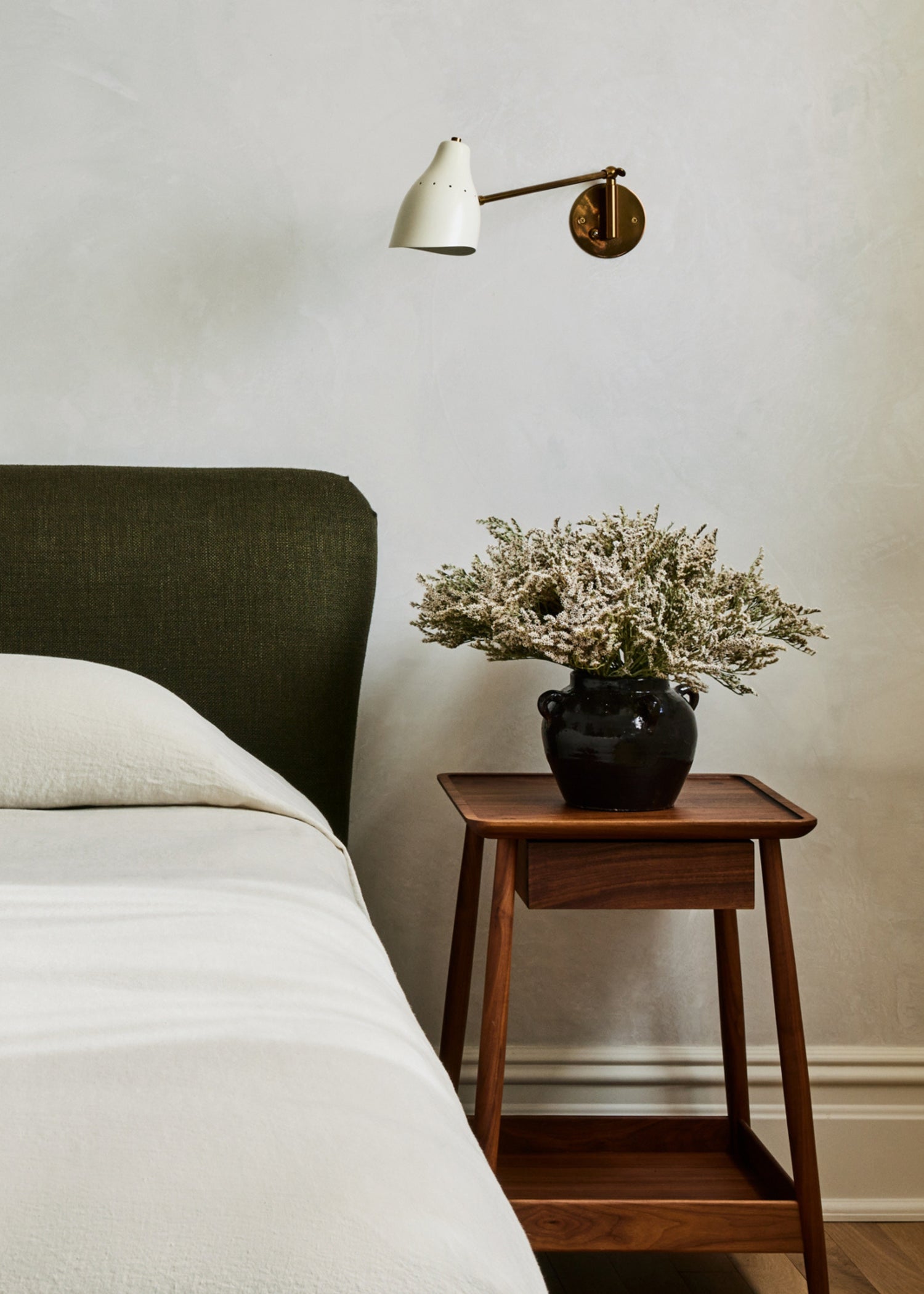 decorative black vase with dried statice