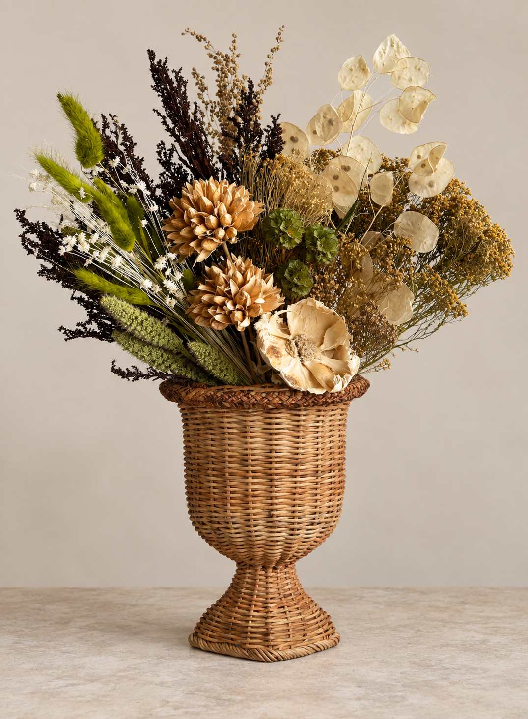 Dried bouquet in wicker urn