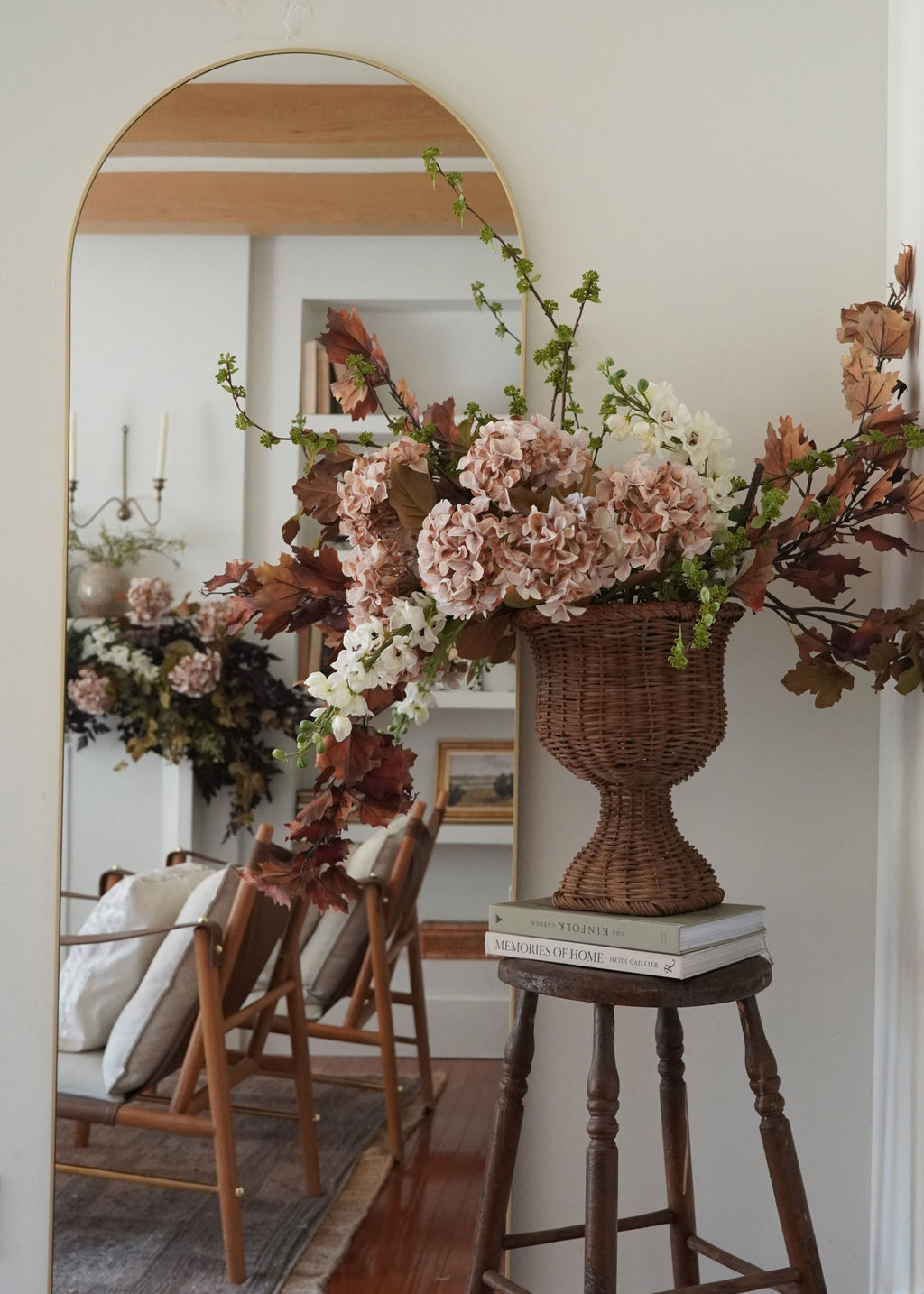 hydrangea, delphinium, and maple leaf arrangement