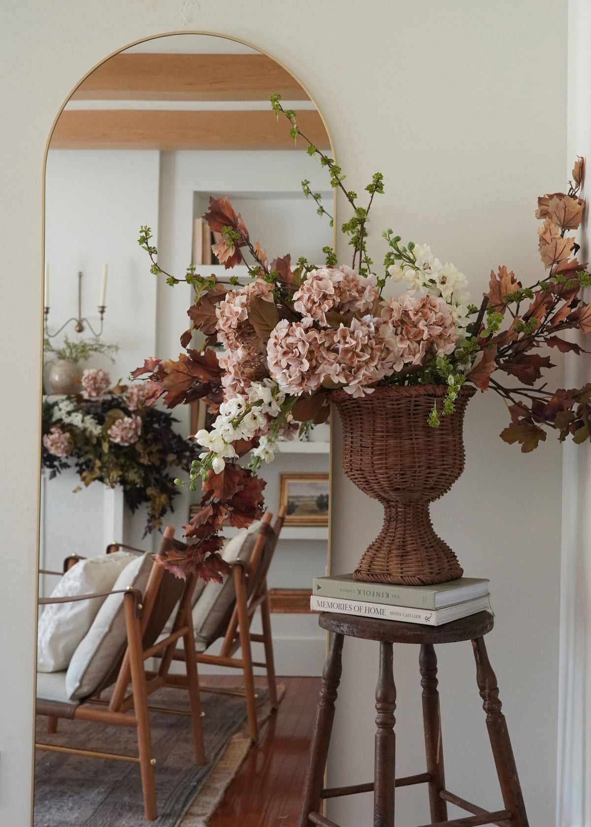 hydrangea, delphinium, and maple leaf arrangement