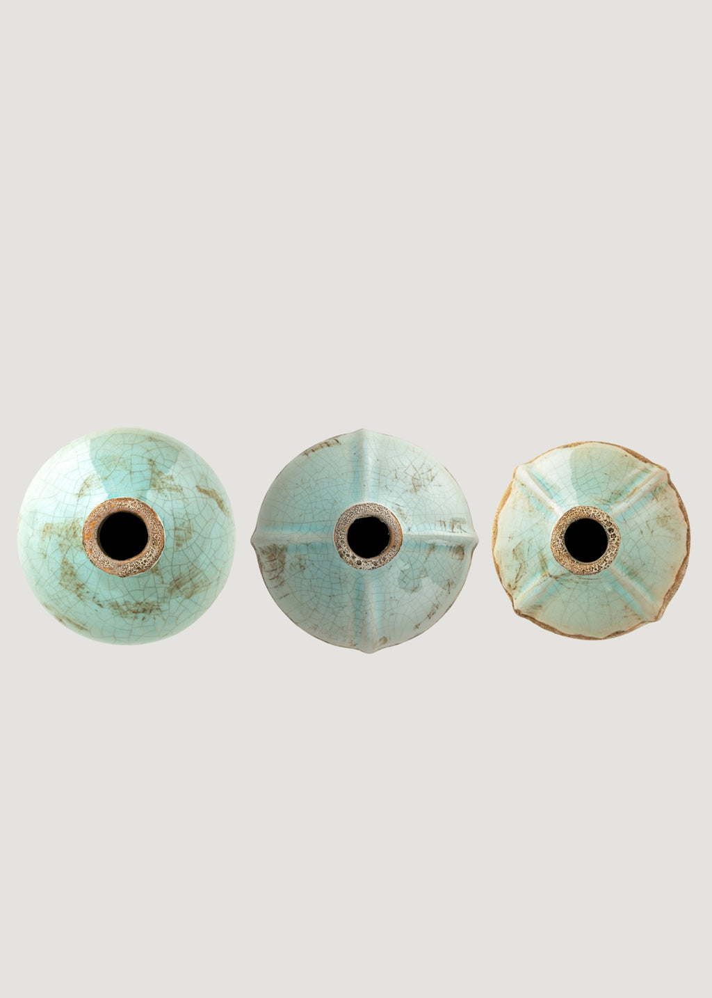 The openings of the Terra Cotta Bud Vases